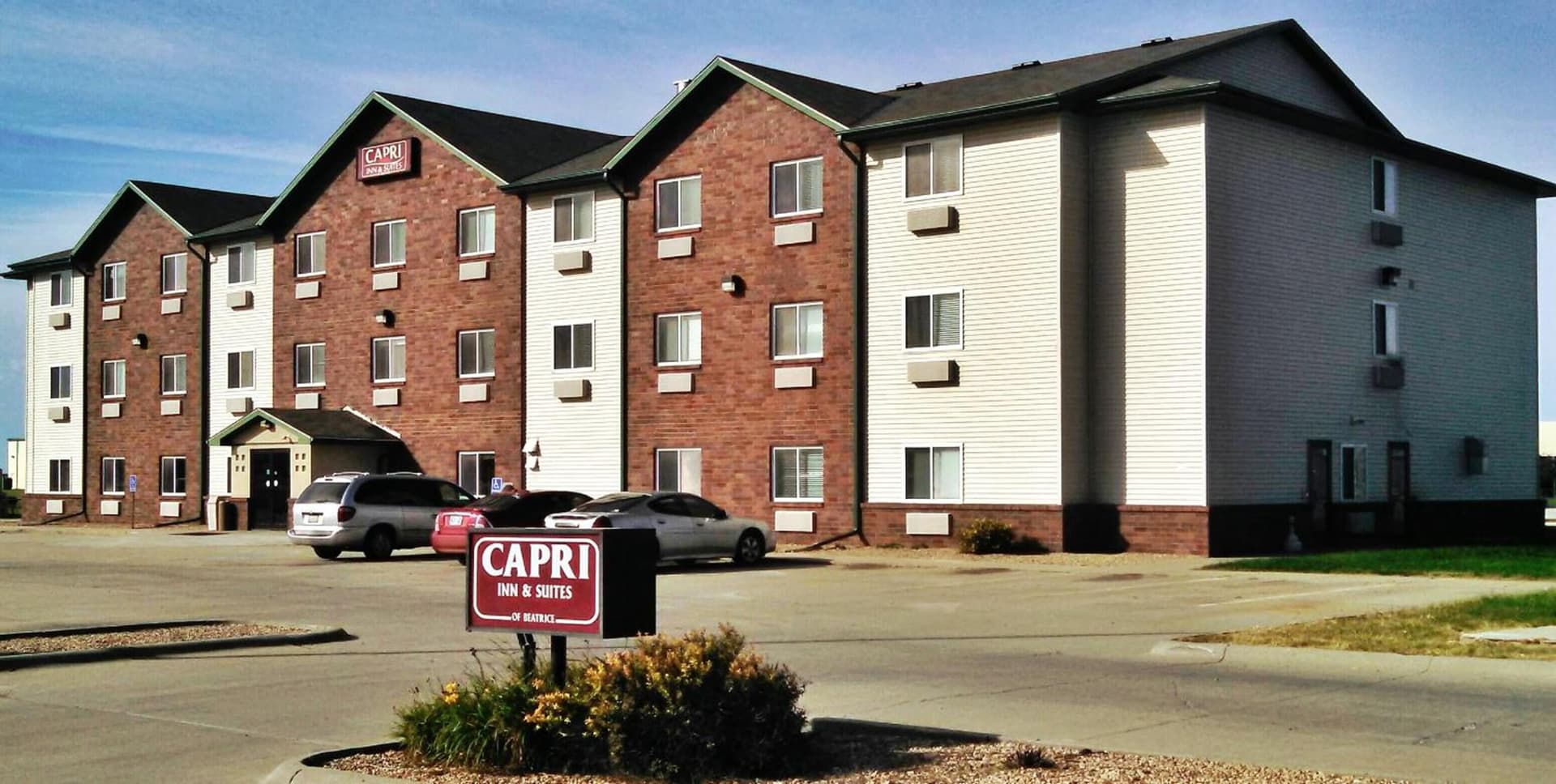 Capri Inn & Suites - Beatrice featured exterior or lobby in Beatrice, NE — similar hotel