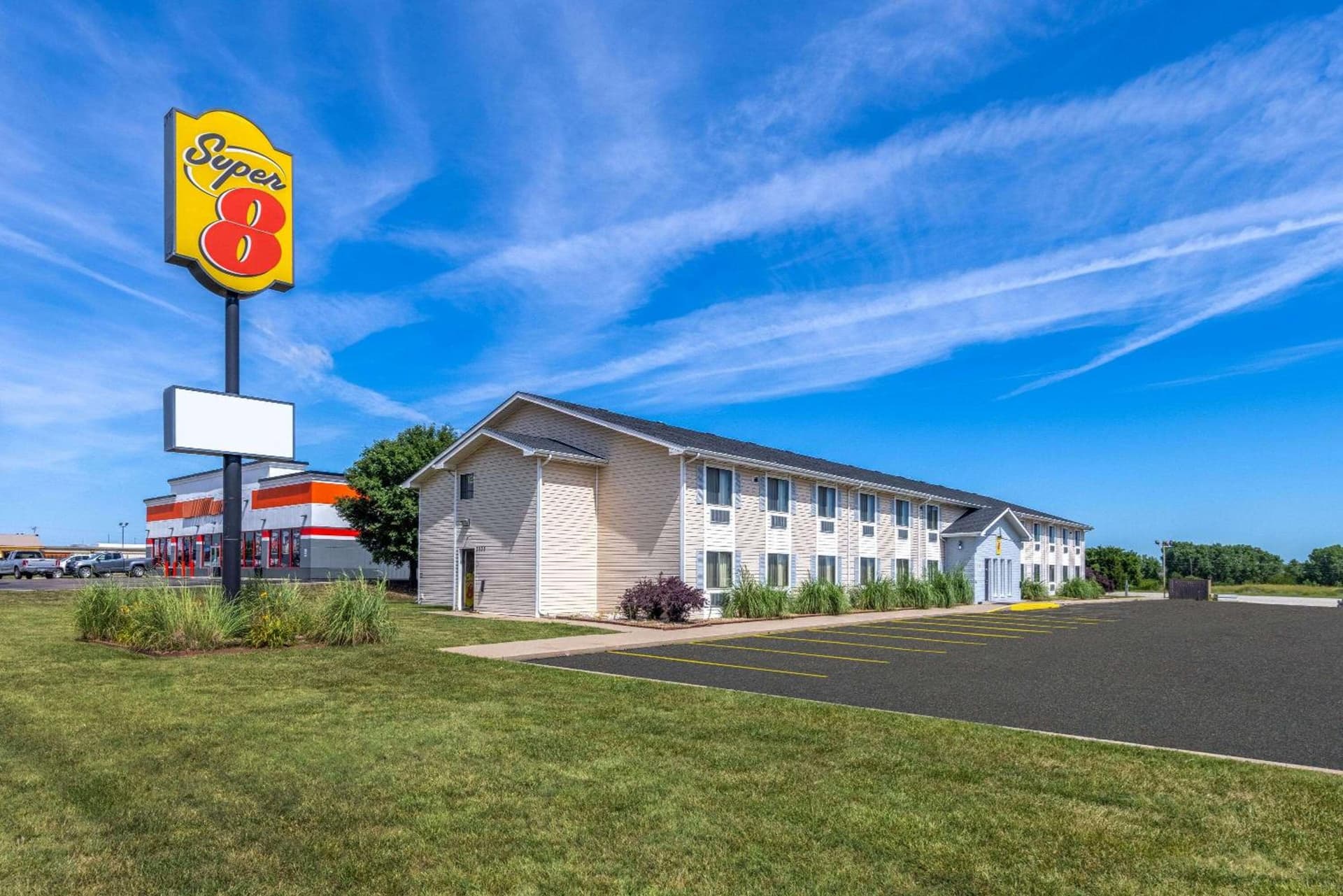 Super 8 by Wyndham El Dorado featured exterior or lobby in El Dorado, KS — similar hotel