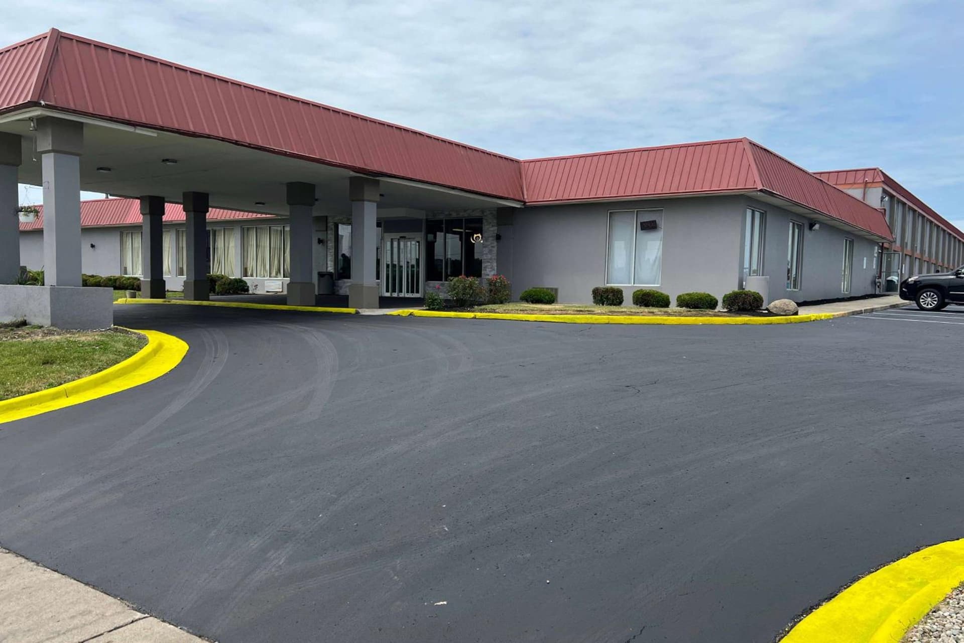 Days Inn & Suites by Wyndham Springfield OH featured exterior or lobby in Springfield, OH — similar hotel