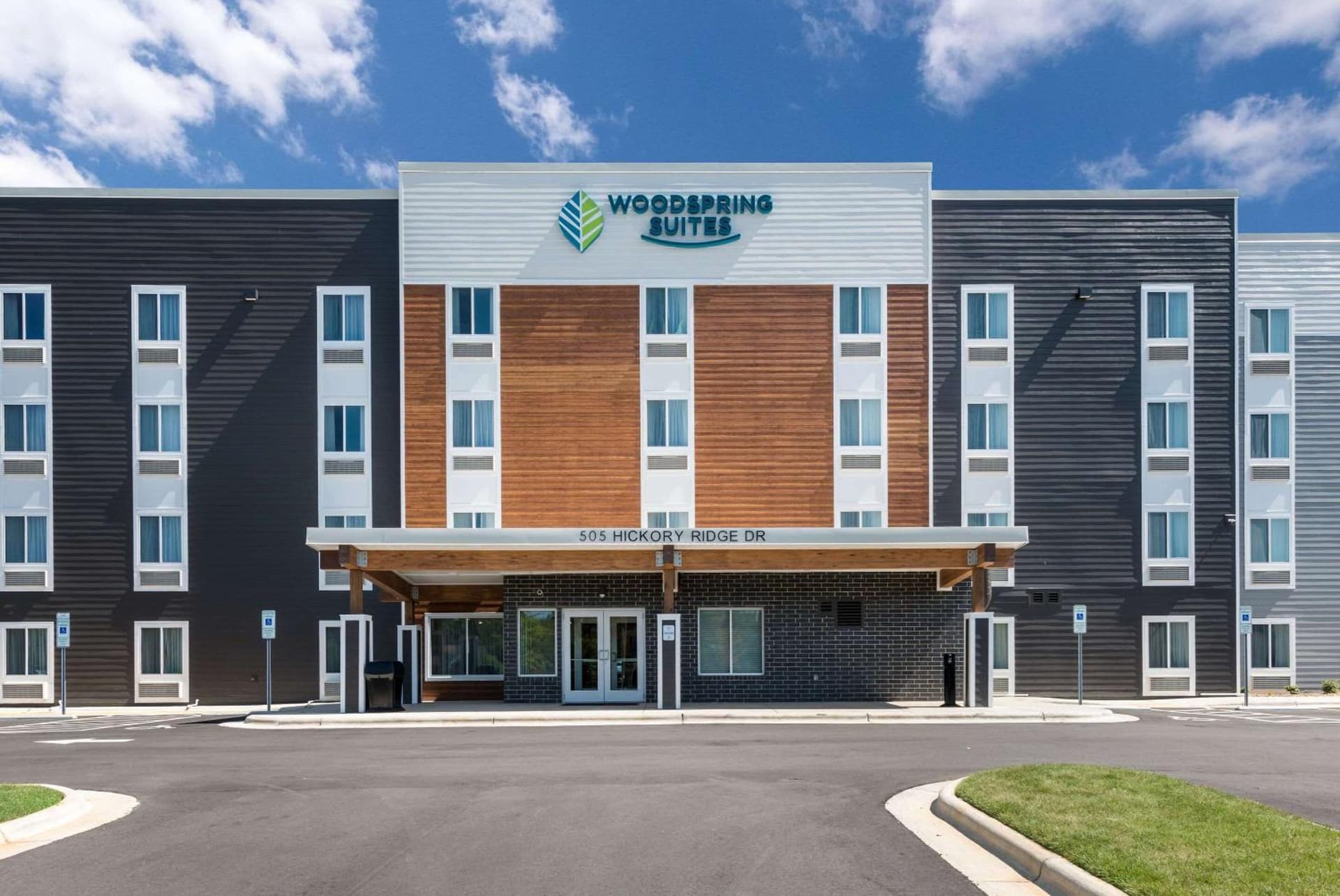 WoodSpring Suites Greensboro - High Point North featured exterior or lobby in Greensboro, NC — similar hotel