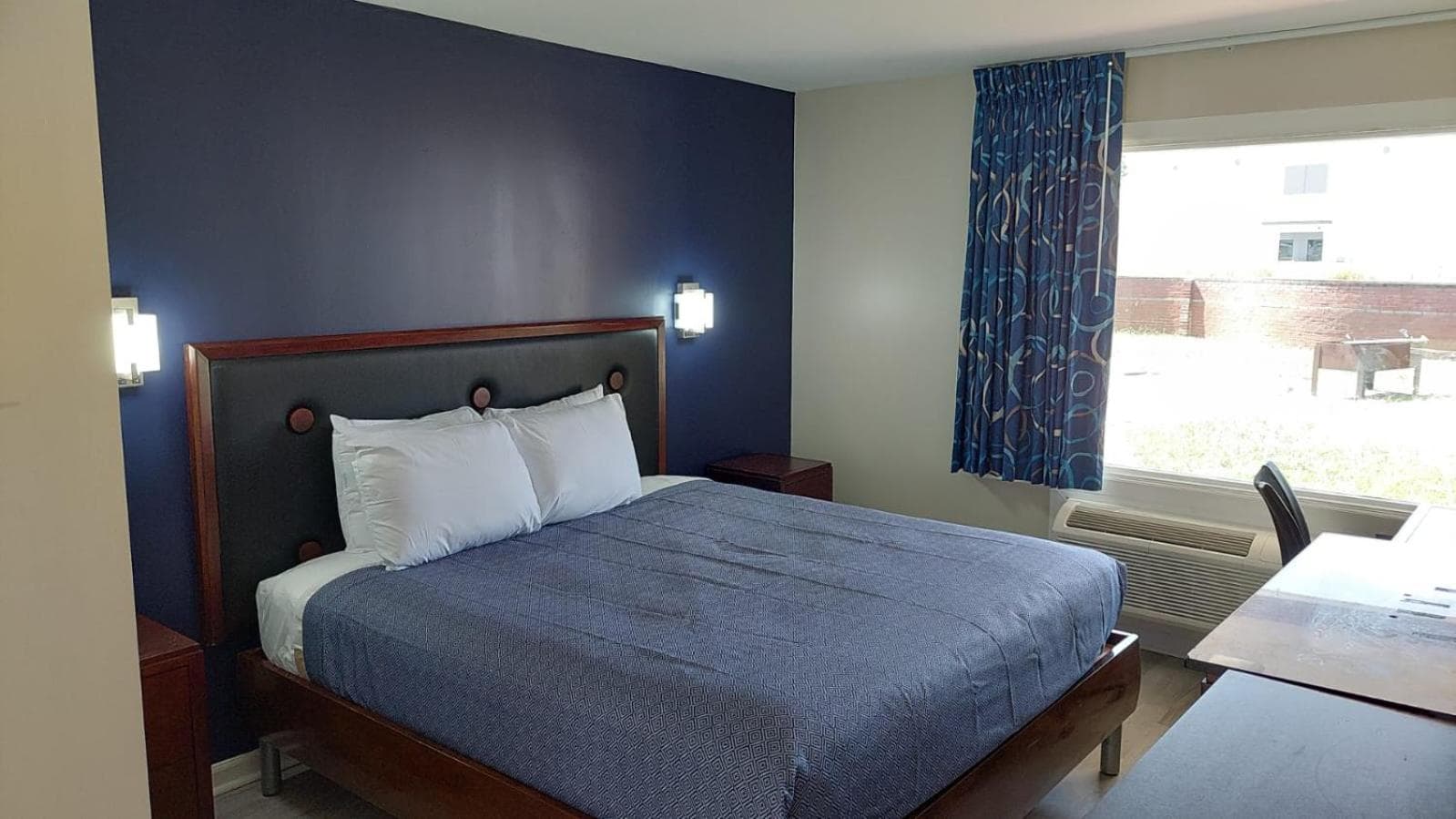 Economy 7 Inn Hampton featured exterior or lobby in Hampton, VA — similar hotel