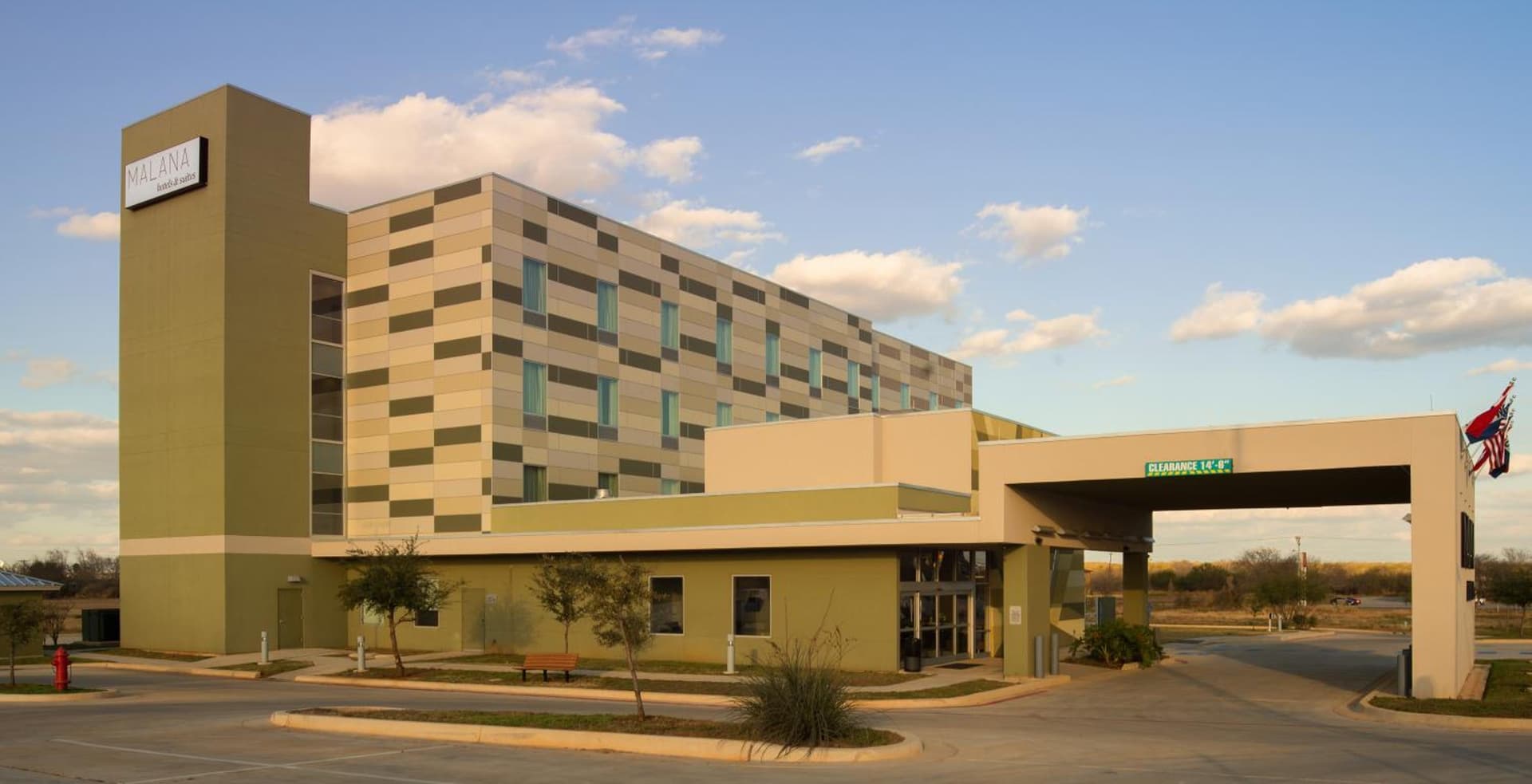 Malana Hotels & Suites exterior or lobby in Cotulla, TX — main listing photo
