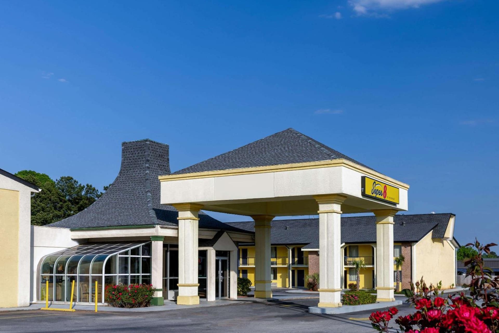 Super 8 by Wyndham McDonough GA featured exterior or lobby in McDonough, GA — similar hotel