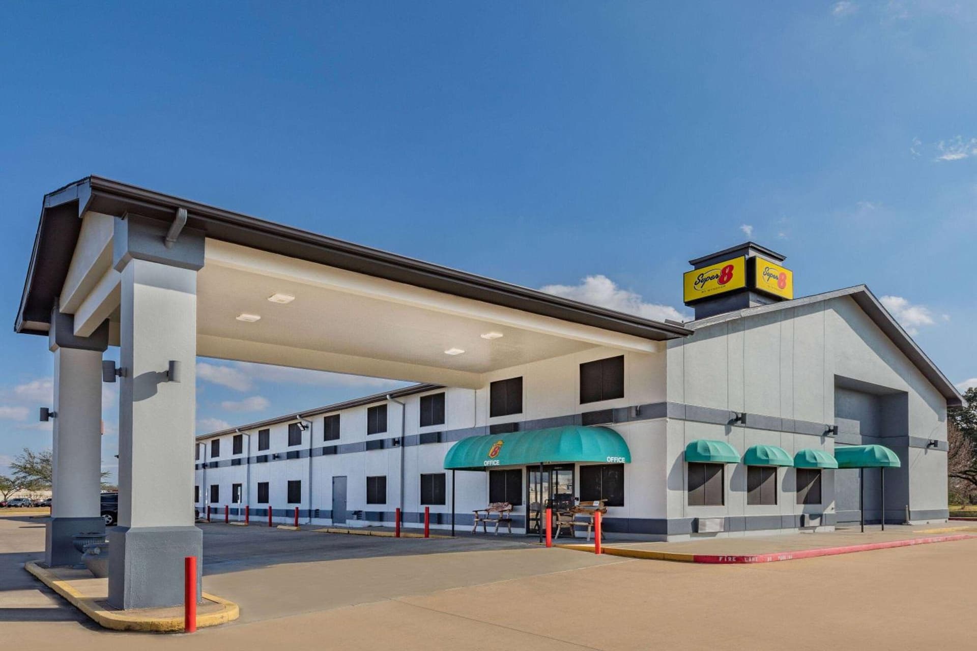 Super 8 by Wyndham League City Kemah Area featured exterior or lobby in League City, TX — similar hotel