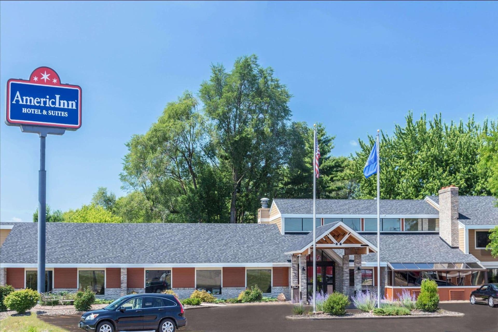AmericInn by Wyndham Chippewa Falls featured exterior or lobby in Chippewa Falls, WI — similar hotel
