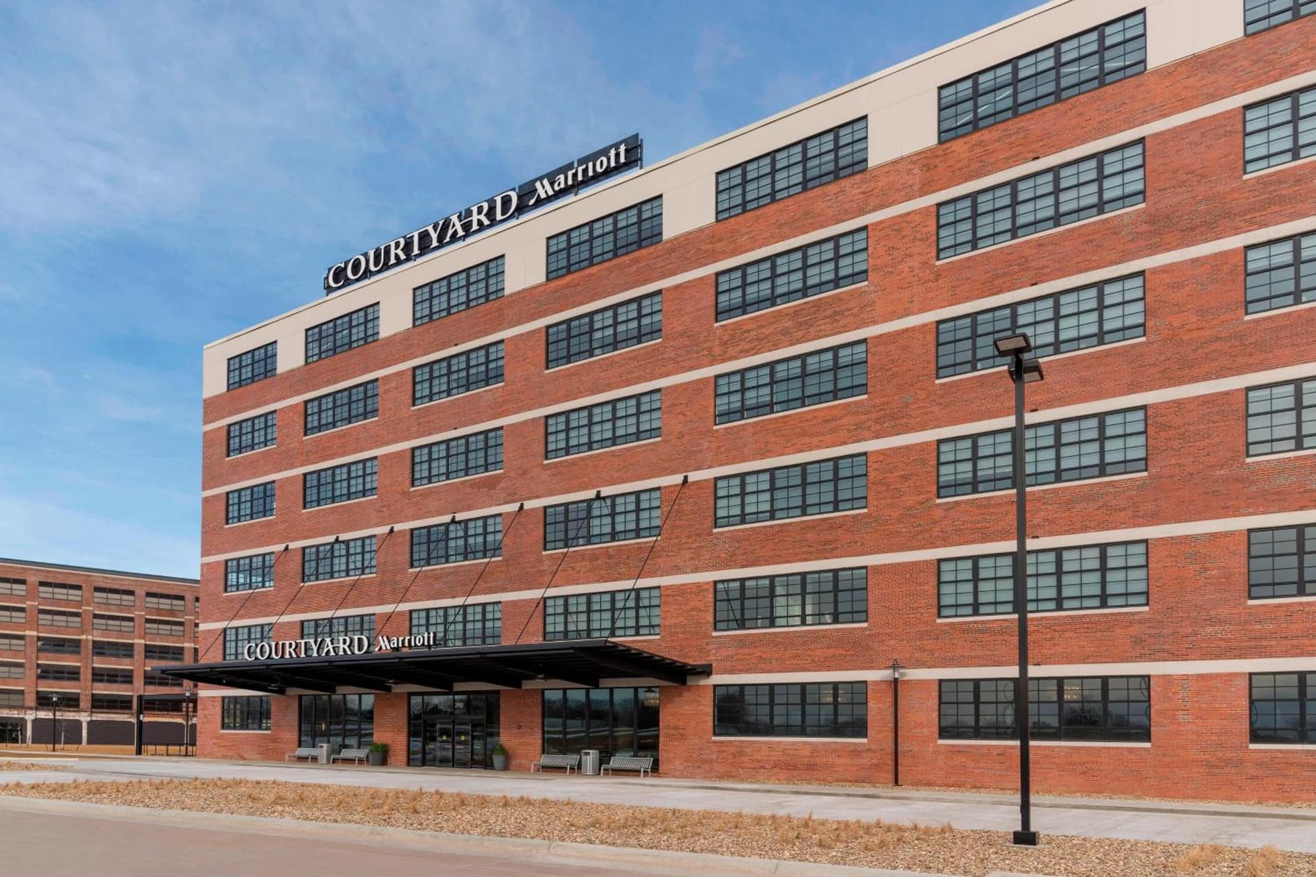 Courtyard by Marriott Waterloo Cedar Falls featured exterior or lobby in Waterloo, IA — similar hotel