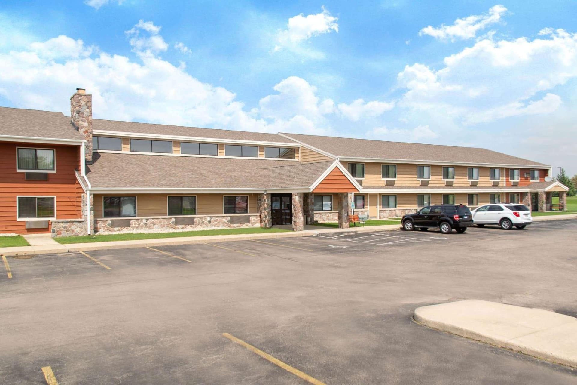 AmericInn by Wyndham Elkhorn Near Lake Geneva featured exterior or lobby in Elkhorn, WI — similar hotel