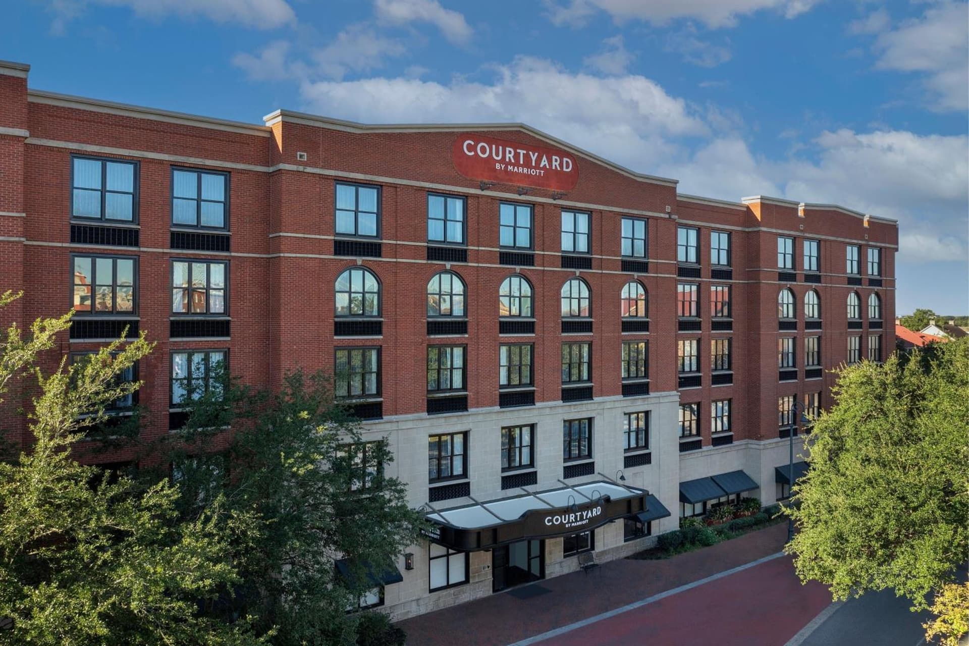 Courtyard by Marriott Savannah Downtown - Historic District featured exterior or lobby in Savannah, GA — similar hotel