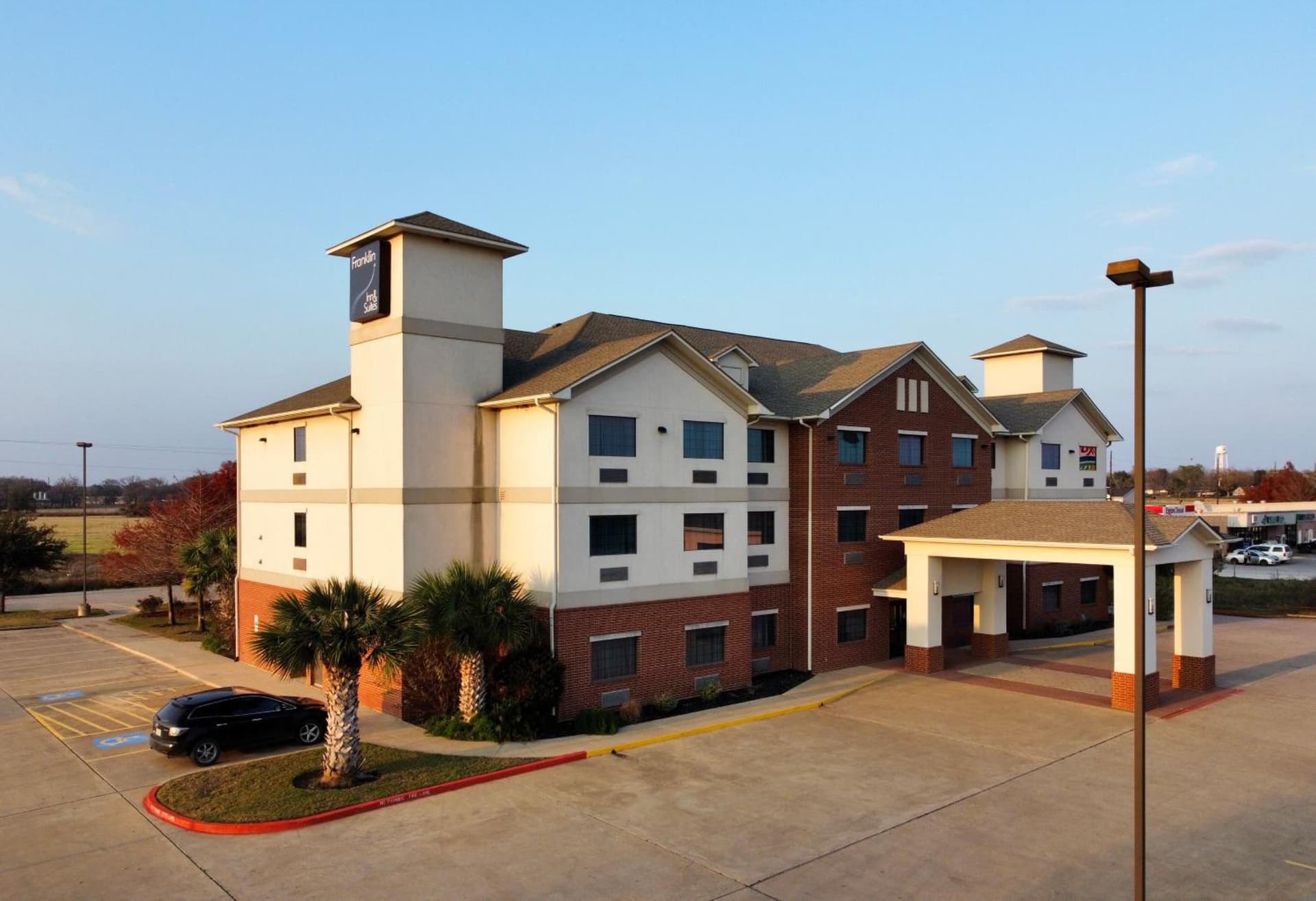 Franklin Inn & Suites featured exterior or lobby in Franklin, TX — similar hotel