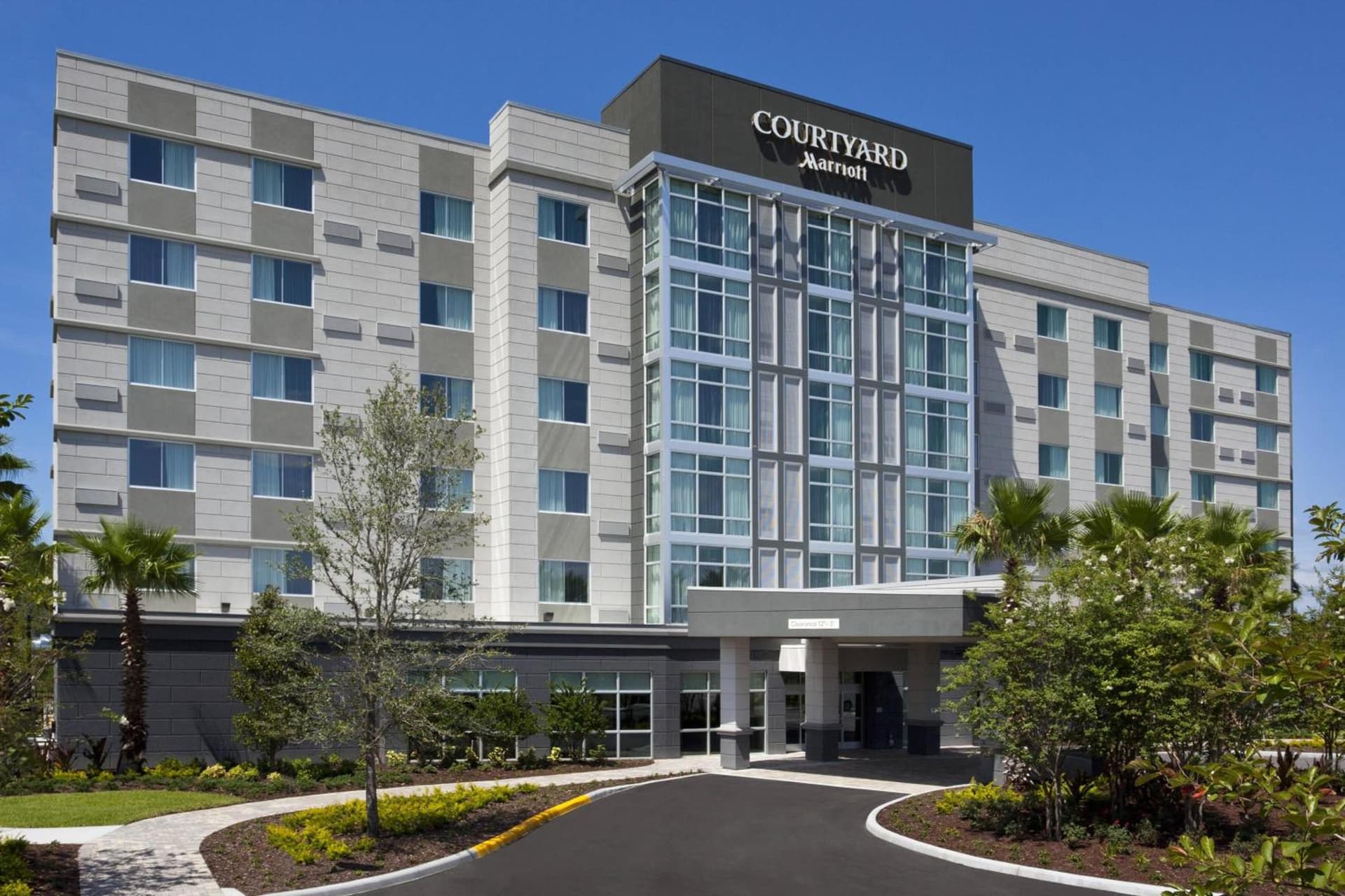 Courtyard by Marriott Orlando South/Grande Lakes Area exterior or lobby in Orlando, FL — main listing photo