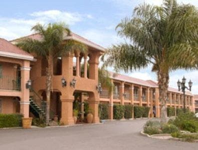 Merced Inn & Suites featured exterior or lobby in Merced, CA — similar hotel
