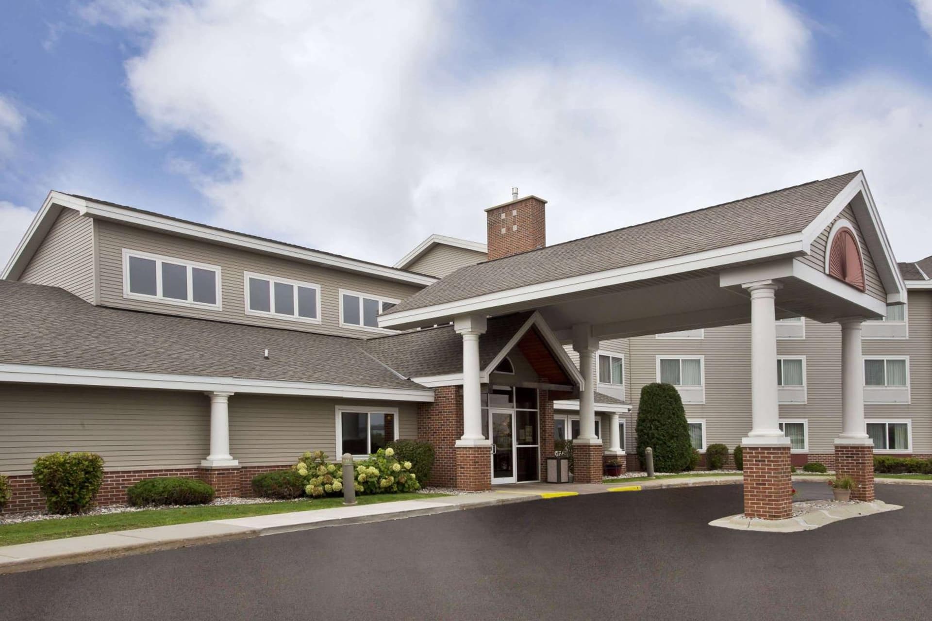 AmericInn by Wyndham Beaver Dam featured exterior or lobby in Beaver Dam, WI — similar hotel