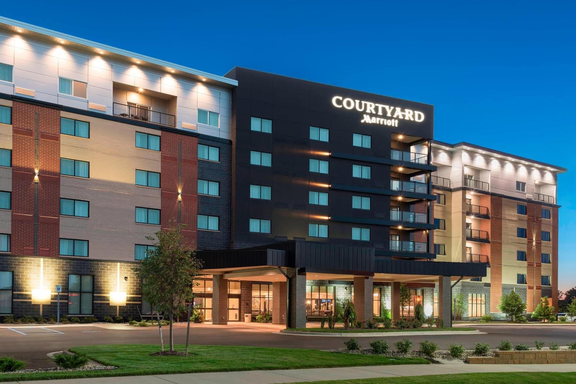 Courtyard by Marriott Mt. Pleasant at Central Michigan University featured exterior or lobby in Mount Pleasant, MI — similar hotel