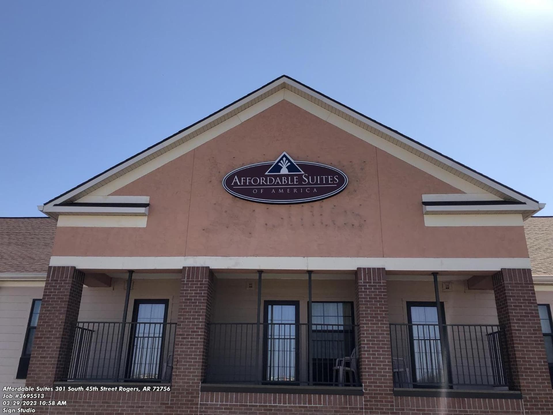 Affordable Suites of America Rogers - Bentonville featured exterior or lobby in Rogers, AR — similar hotel