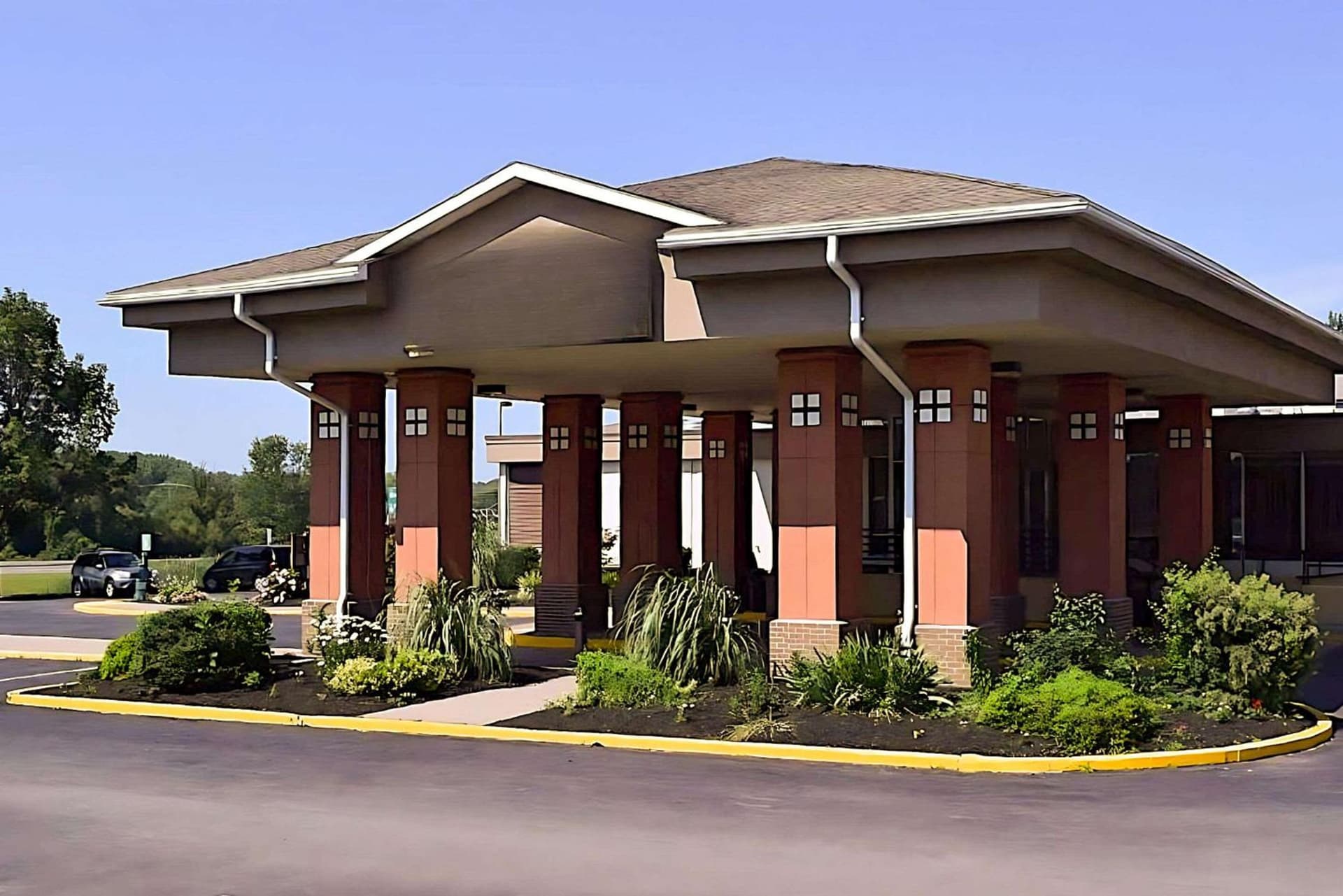 Quality Inn & Suites Syracuse - Carrier Circle featured exterior or lobby in East Syracuse, NY — similar hotel