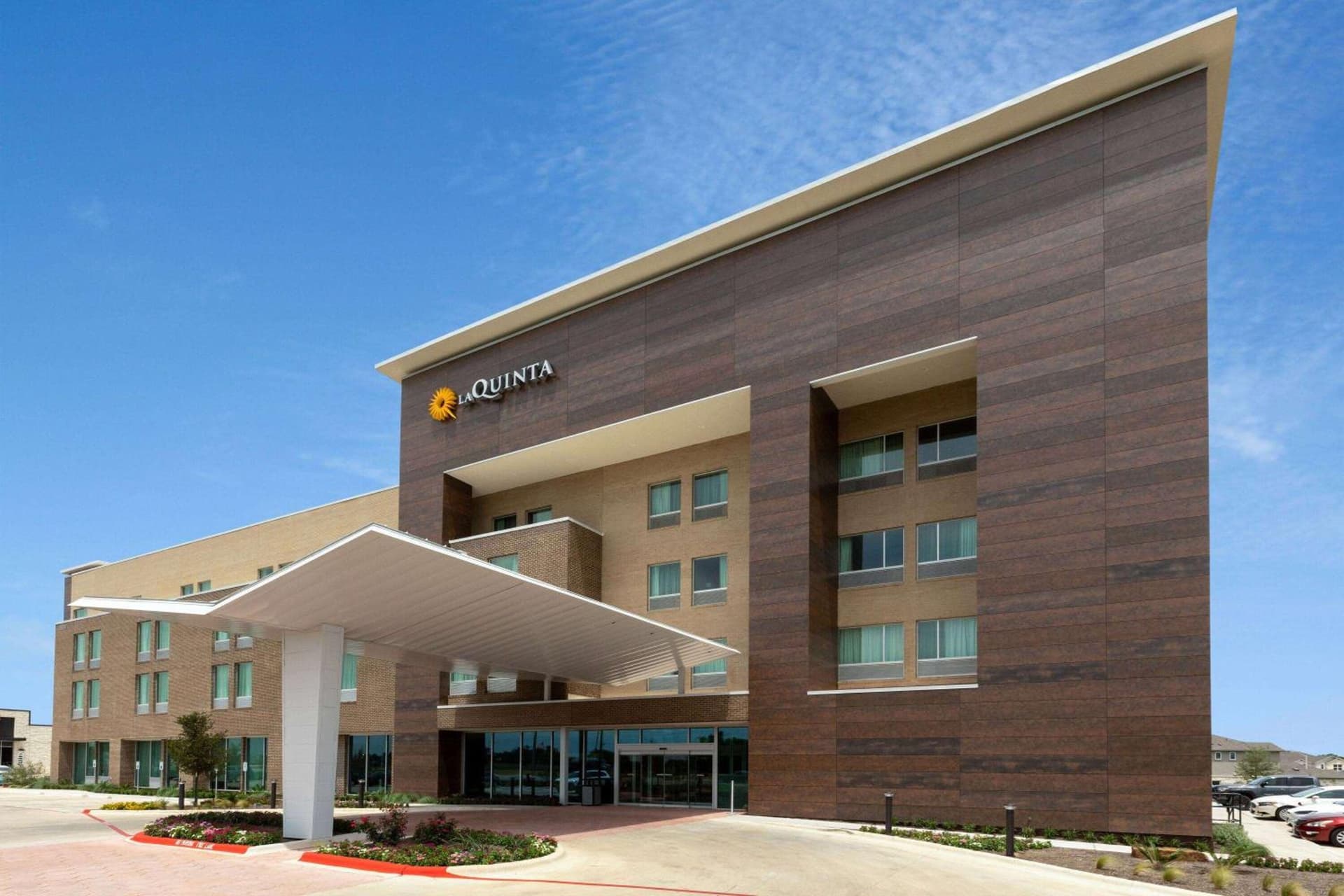 La Quinta Inn & Suites by Wyndham Round Rock near Kalahari exterior or lobby in Round Rock, TX — main listing photo