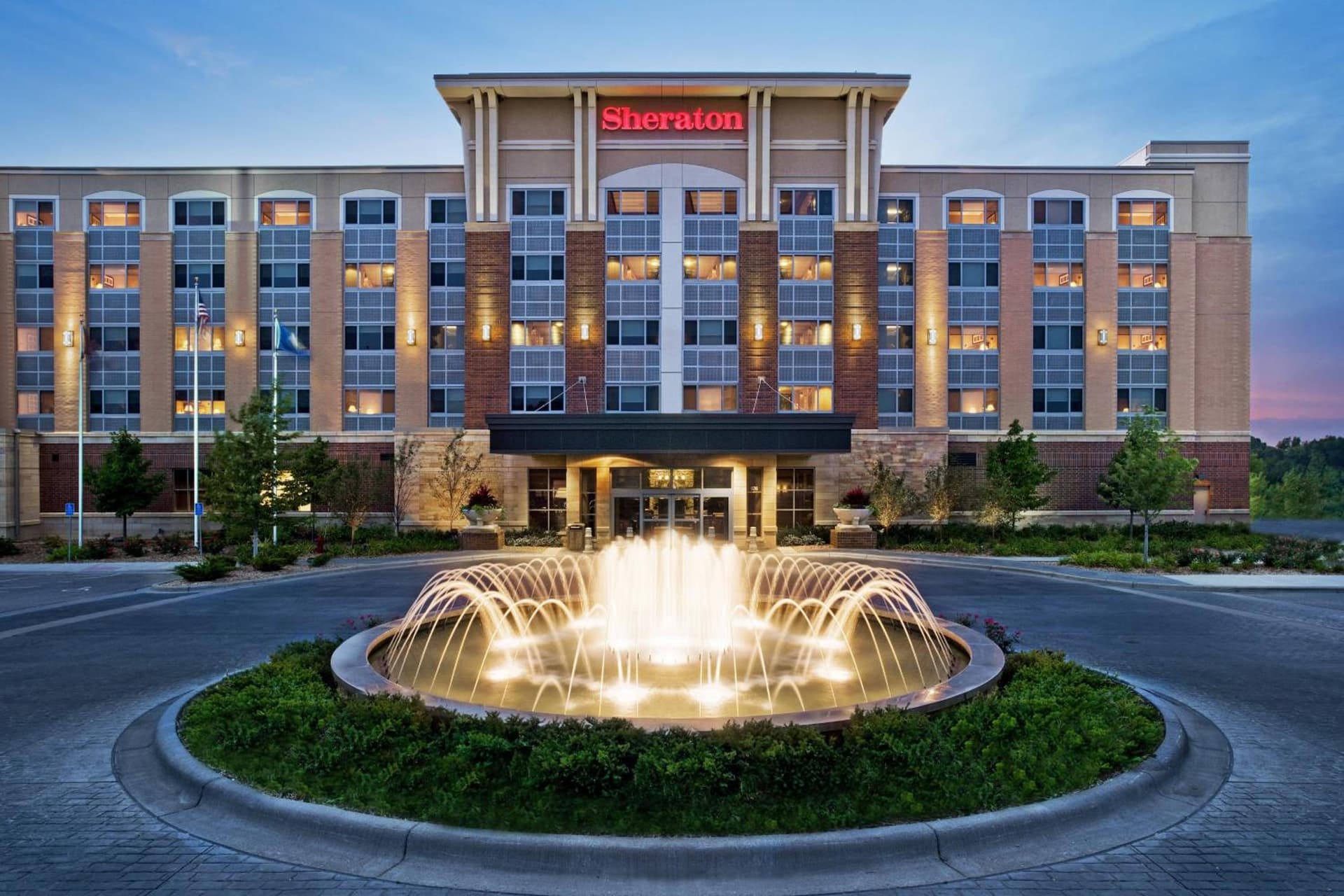 Sheraton St. Paul Woodbury Hotel exterior or lobby in Woodbury, MN — main listing photo
