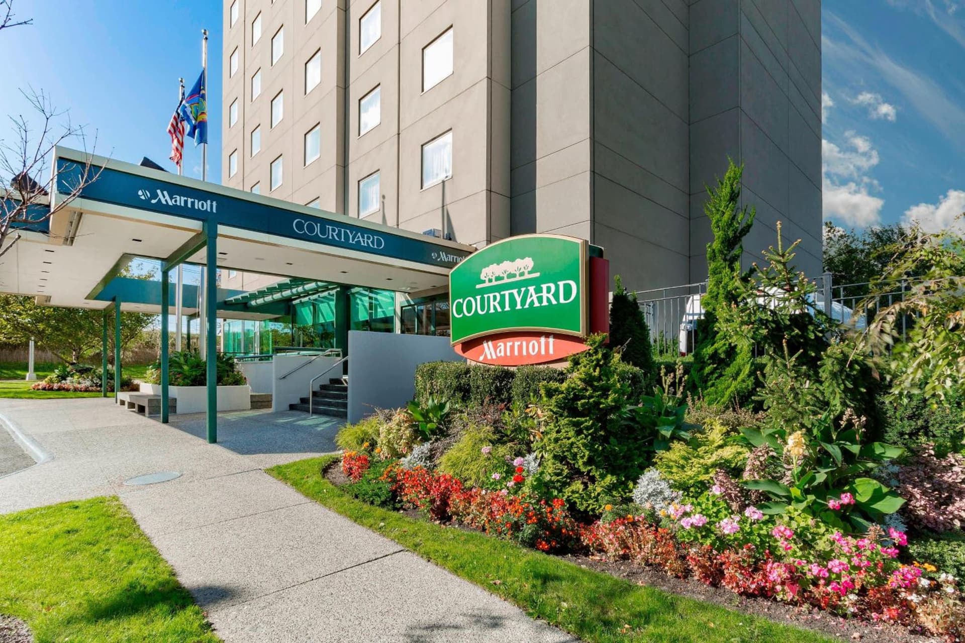 Courtyard by Marriott New York JFK Airport featured exterior or lobby in Queens, NY — similar hotel