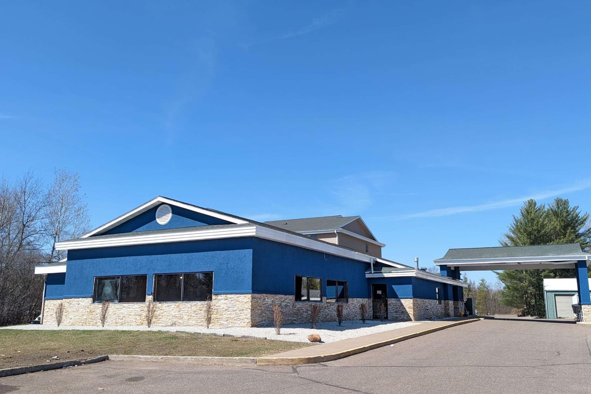 AmericInn by Wyndham Tomahawk featured exterior or lobby in Tomahawk, WI — similar hotel