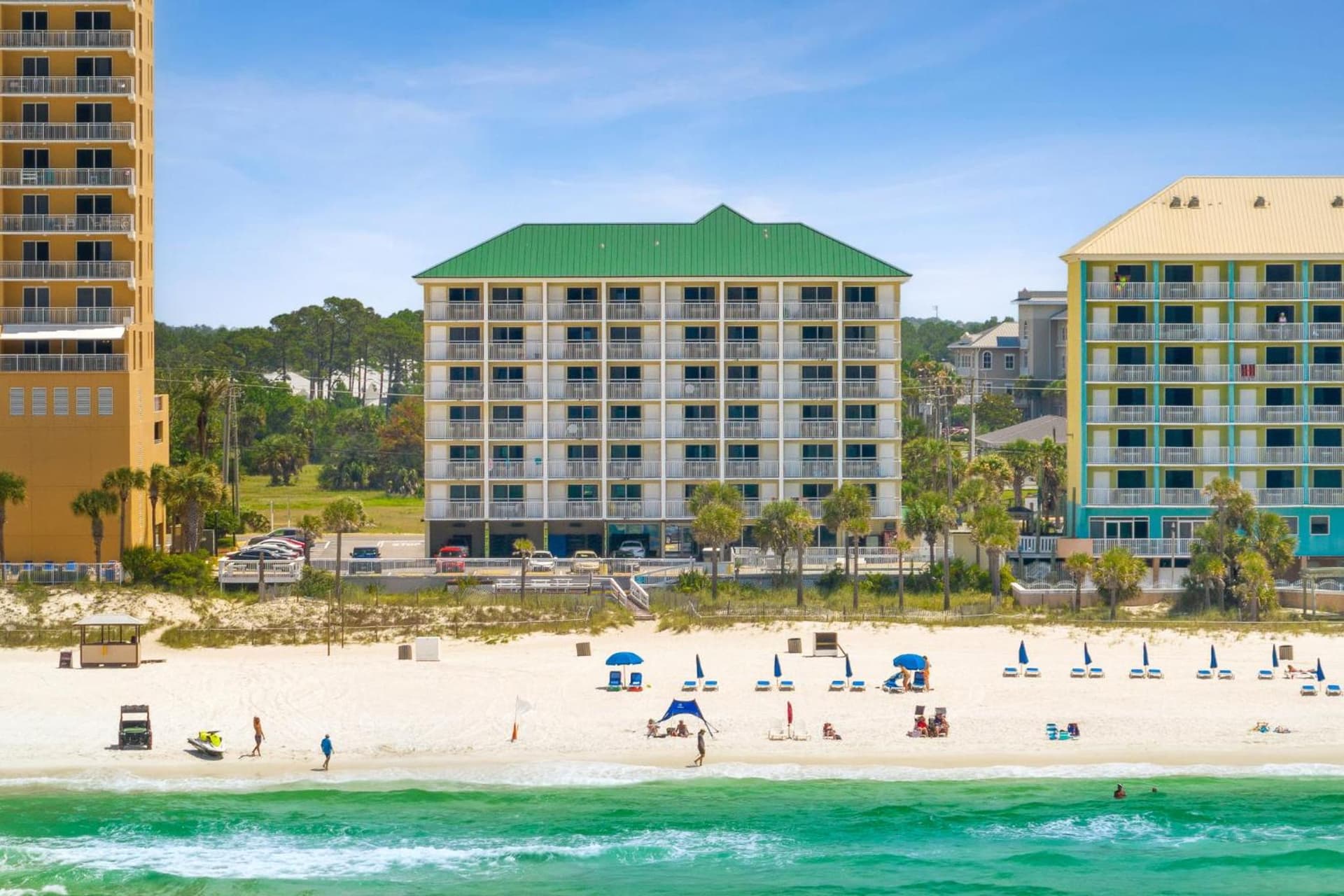 Palm & Tide Beachfront Hotel featured exterior or lobby in Panama City Beach, FL — similar hotel