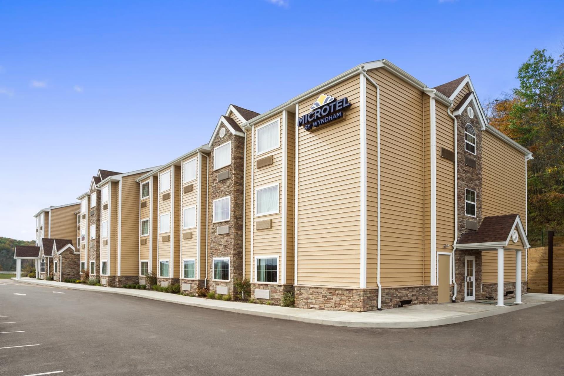 Microtel Inn & Suites by Wyndham Cambridge featured exterior or lobby in Cambridge, OH — similar hotel