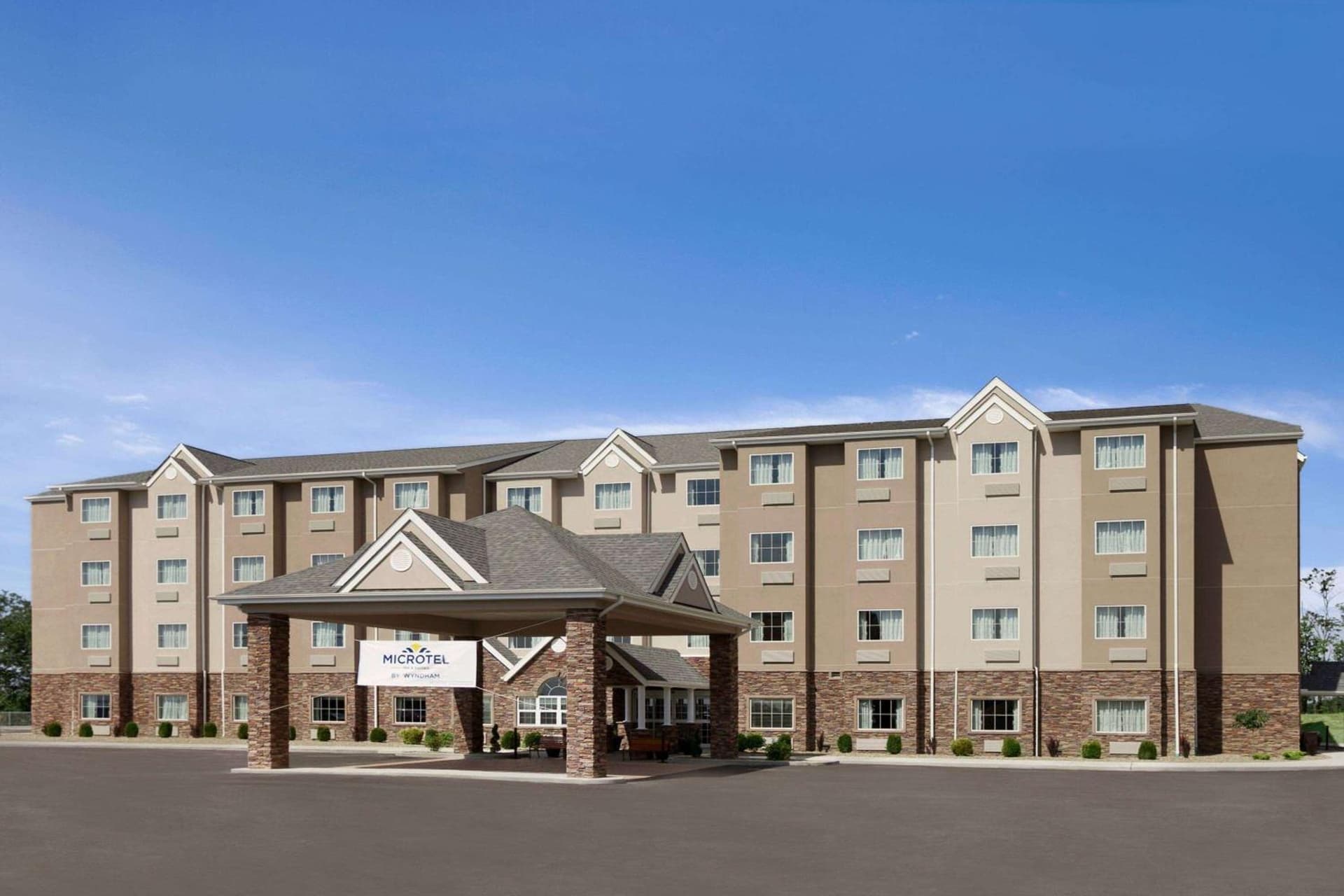 Microtel Inn & Suites by Wyndham St Clairsville - Wheeling featured exterior or lobby in Saint Clairsville, OH — similar hotel