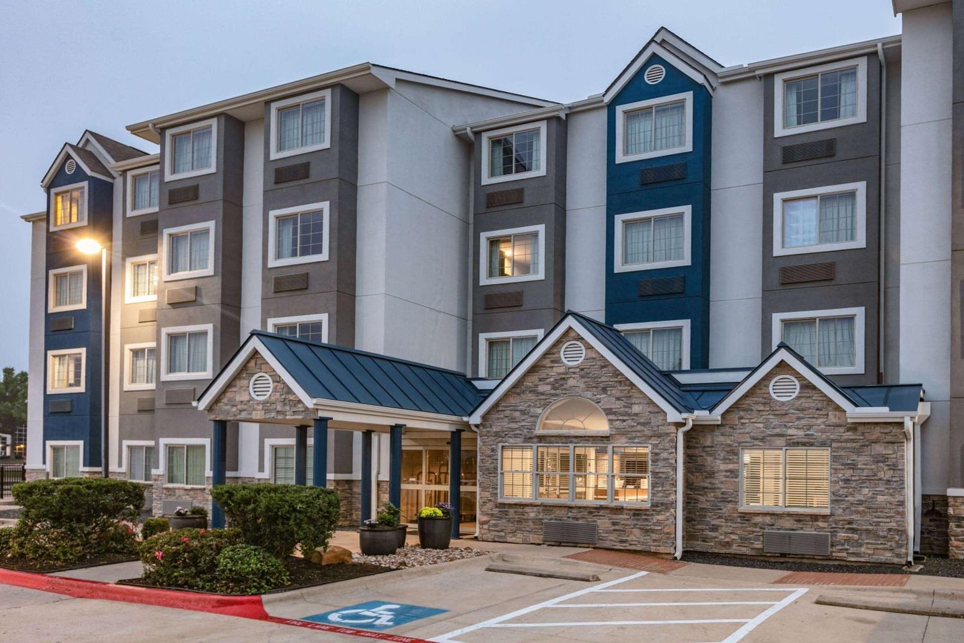Microtel Inn & Suites by Wyndham Austin Airport featured exterior or lobby in Austin, TX — similar hotel