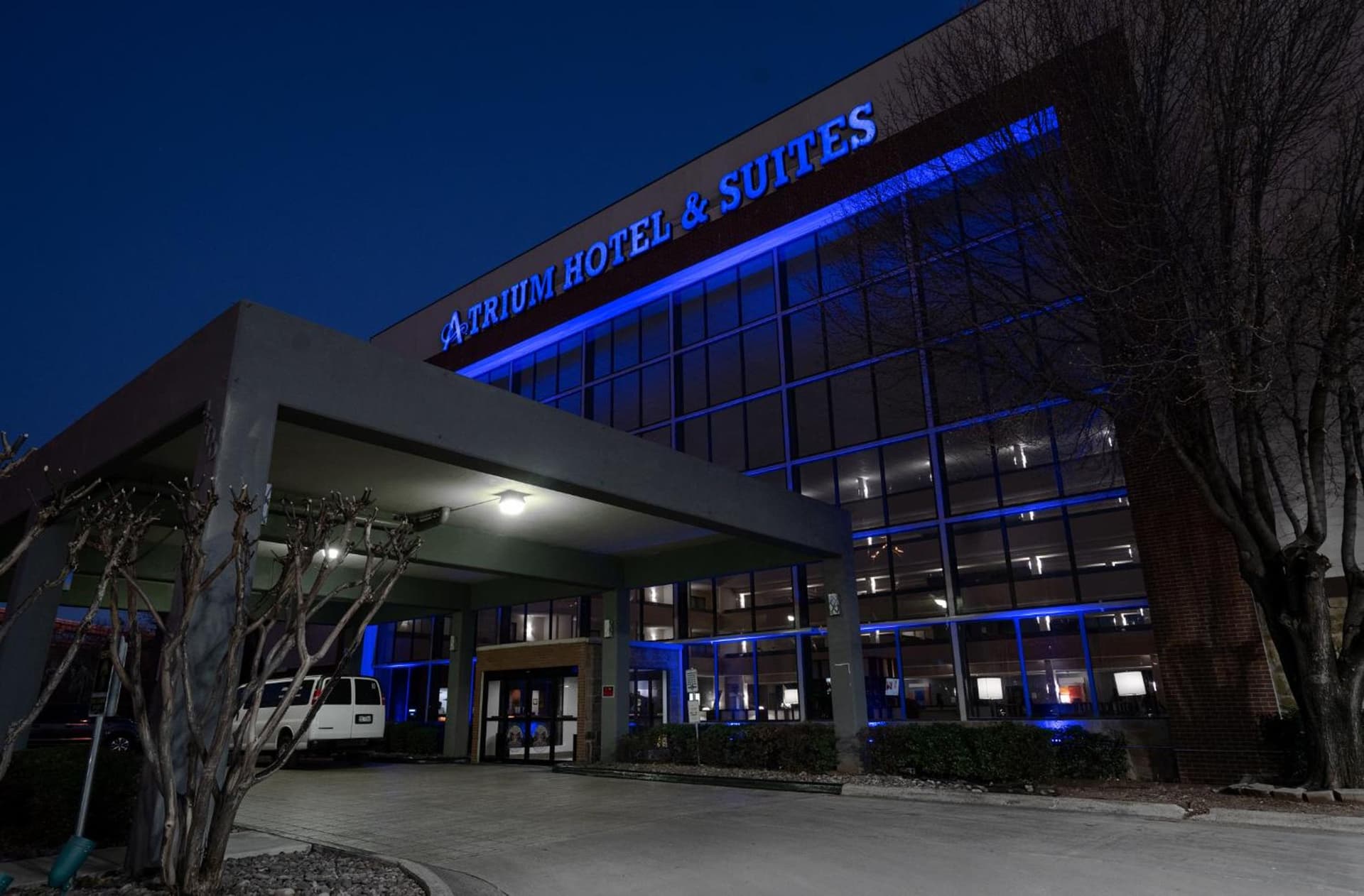 Atrium Hotel and Suites DFW Airport featured exterior or lobby in Irving, TX — similar hotel