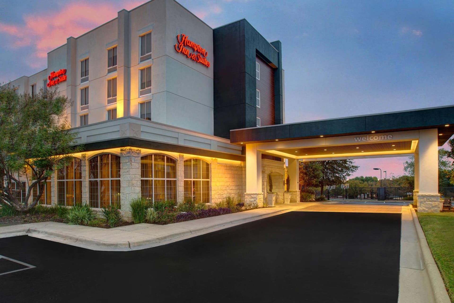 Hampton Inn & Suites-Austin Airport featured exterior or lobby in Austin, TX — similar hotel