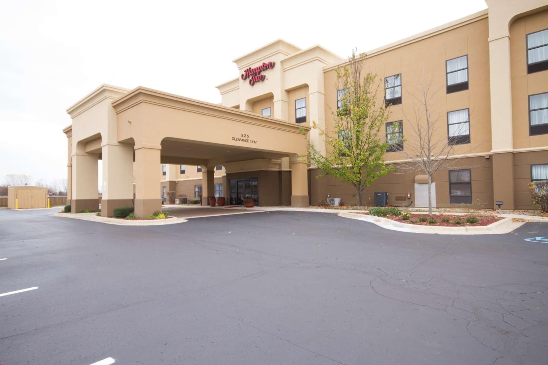 Hampton Inn Marshall featured exterior or lobby in Marshall, MI — similar hotel