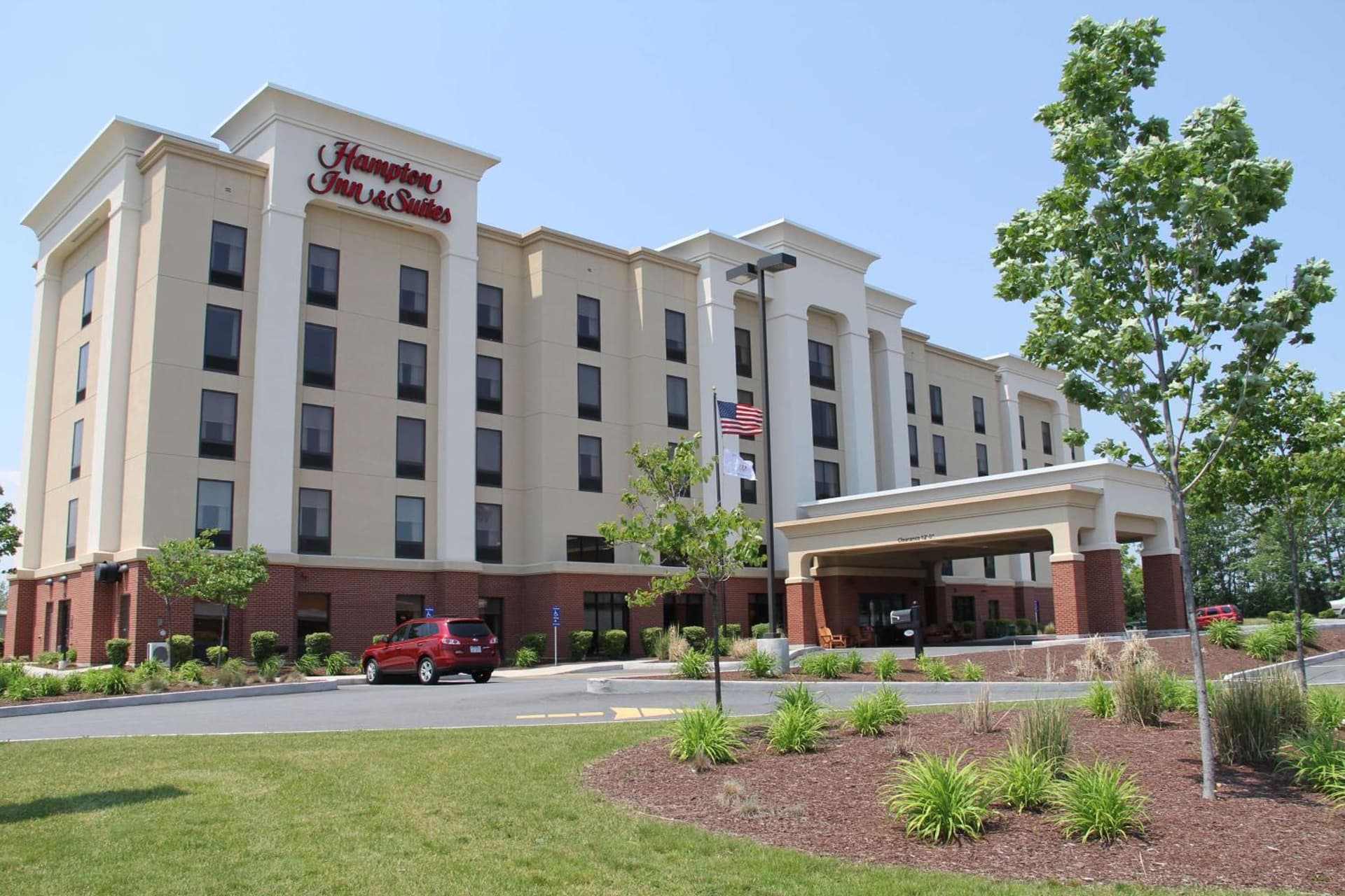 Hampton Inn & Suites Plattsburgh featured exterior or lobby in Plattsburgh, NY — similar hotel