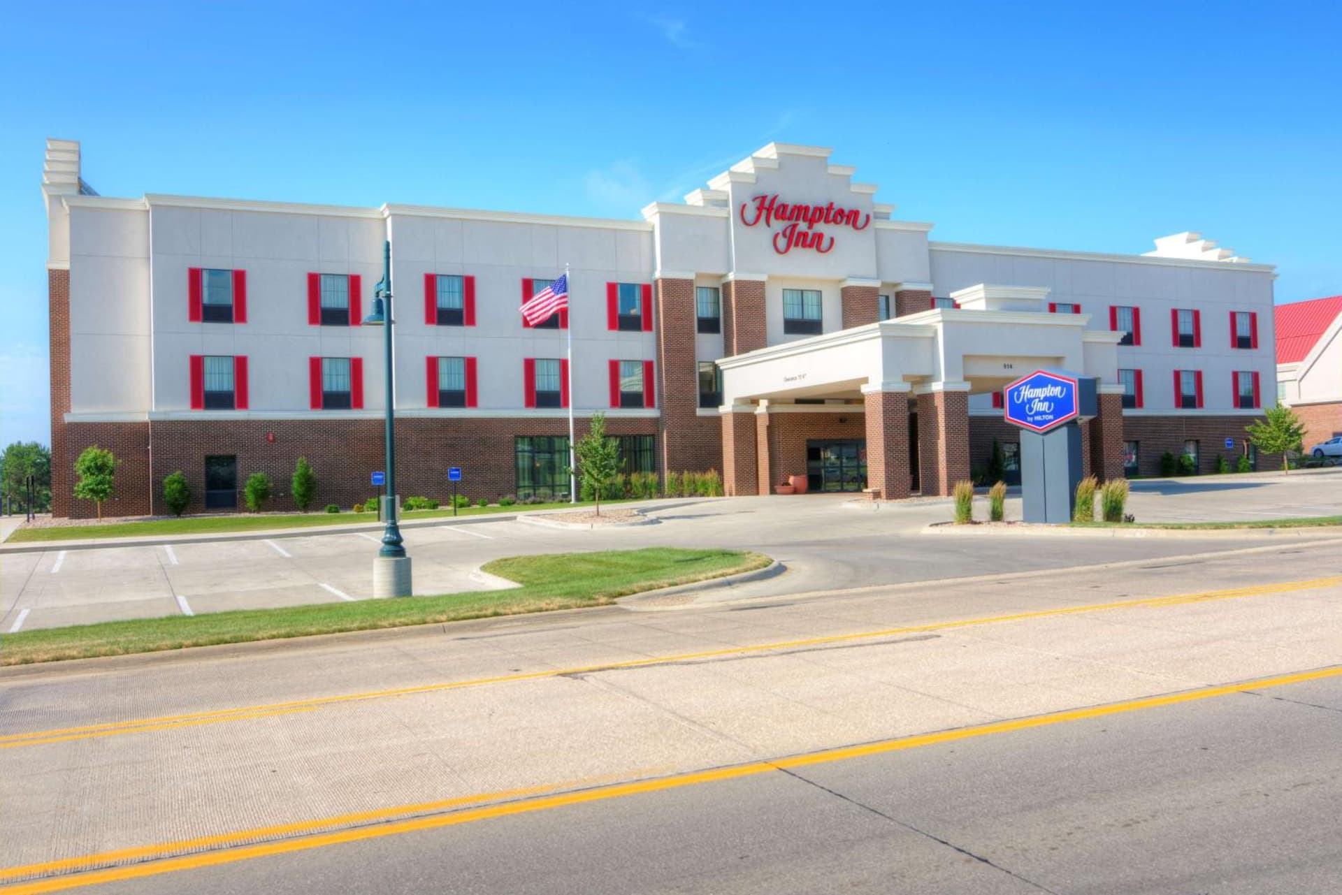 Hampton Inn Orange City featured exterior or lobby in Orange City, IA — similar hotel