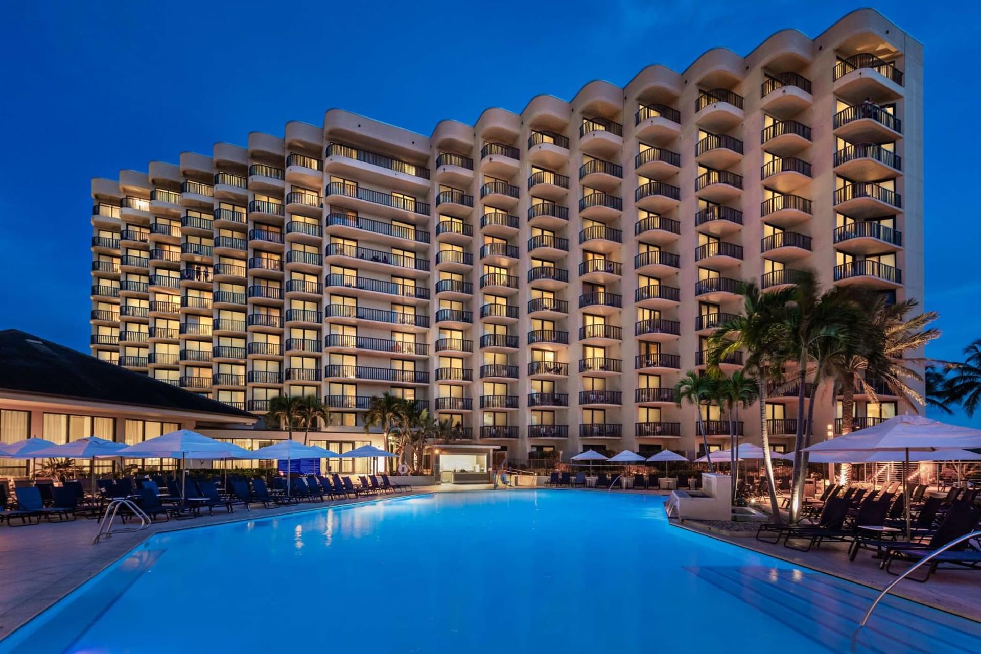 Hilton Marco Island Beach Resort and Spa exterior or lobby in Marco Island, FL — main listing photo