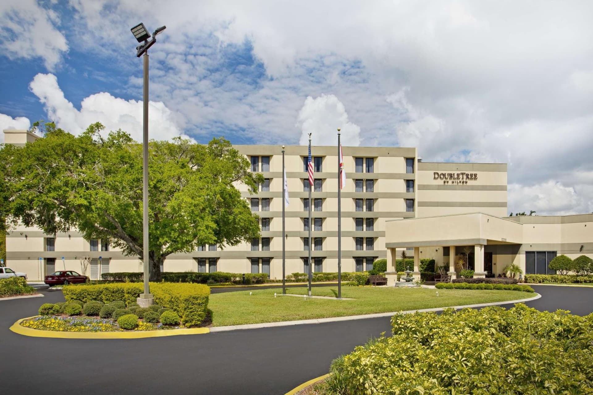 DoubleTree by Hilton Orlando East - UCF Area featured exterior or lobby in Orlando, FL — similar hotel