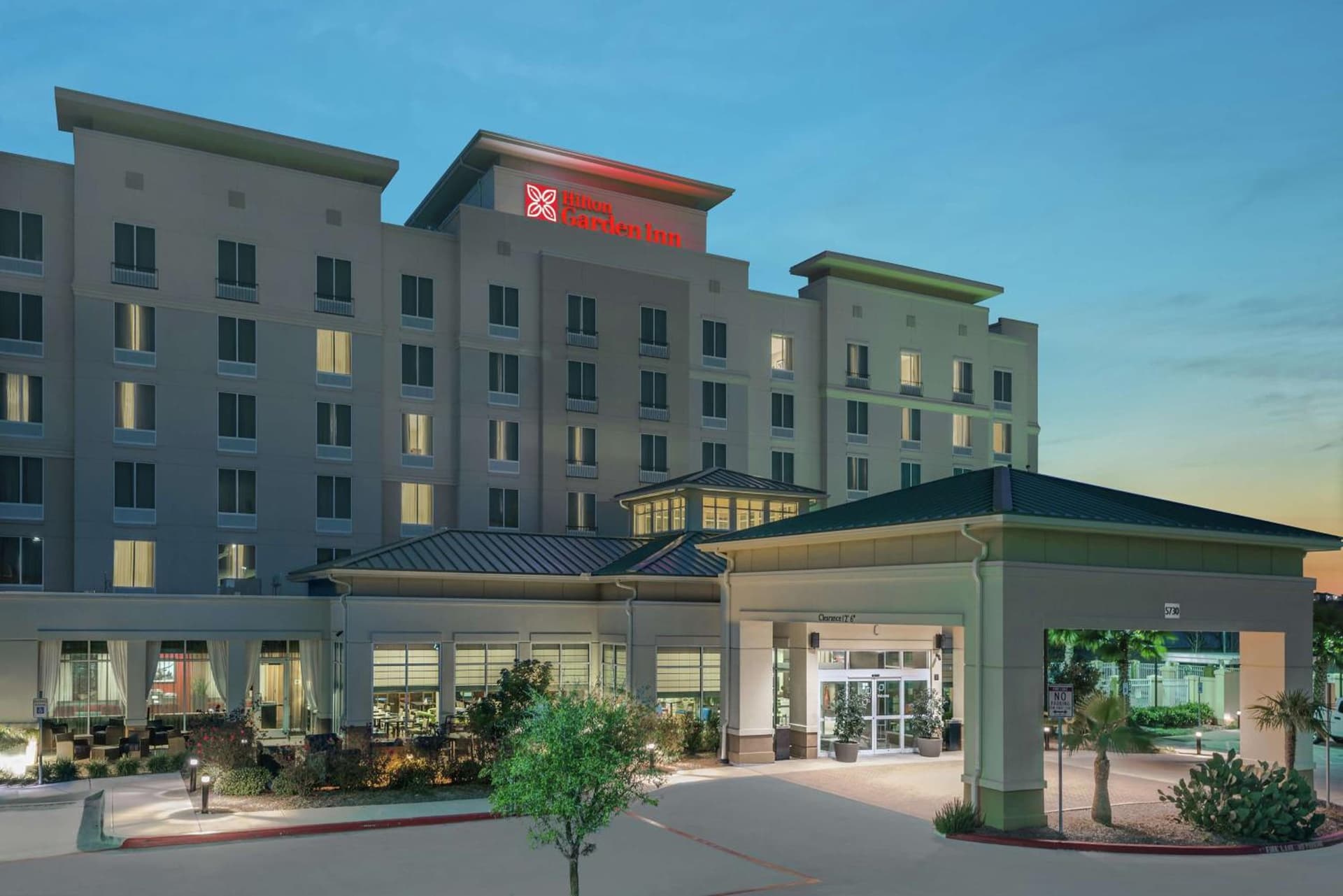 Hilton Garden Inn San Antonio/Rim Pass Drive exterior or lobby in San Antonio, TX — main listing photo