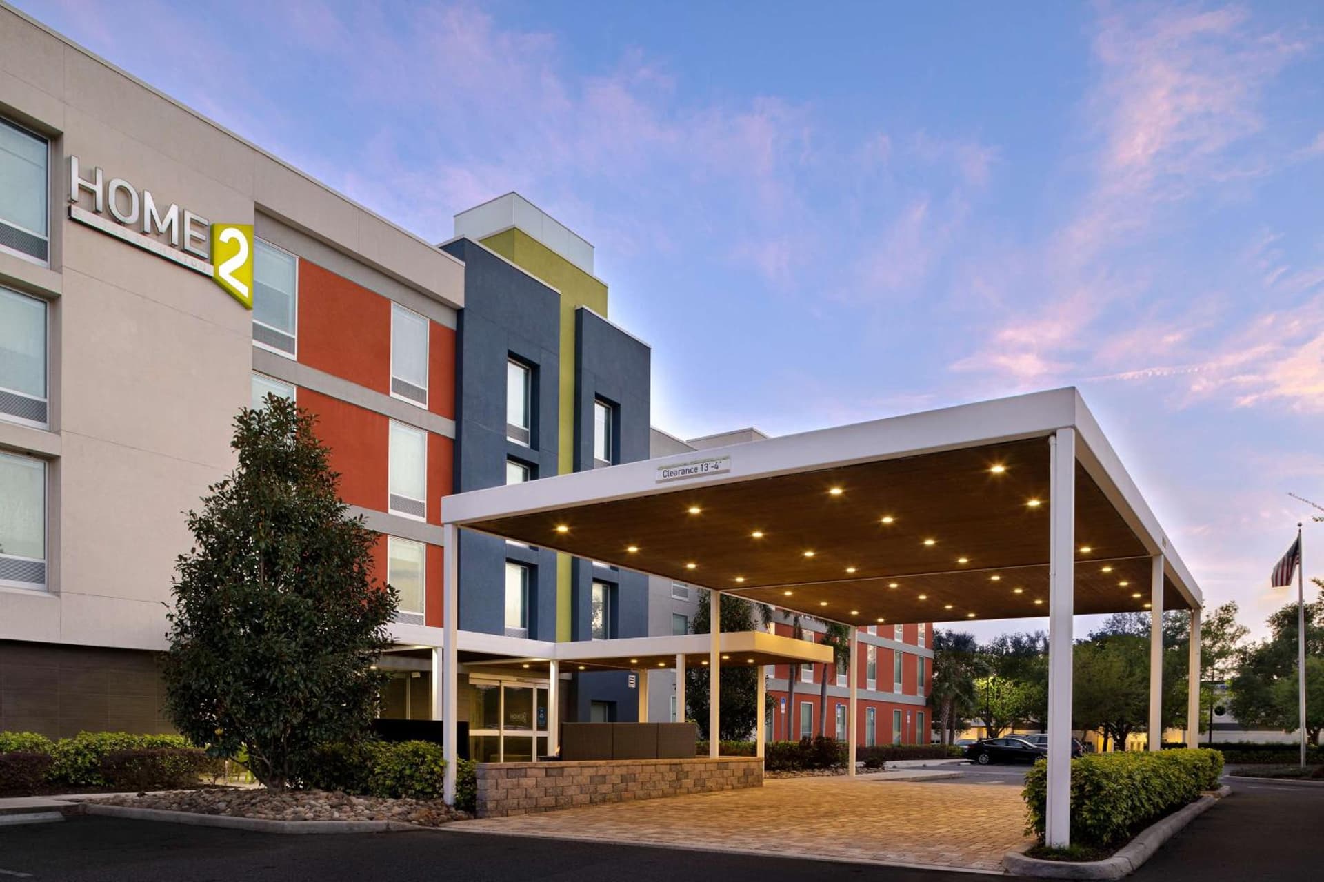 Home2 Suites by Hilton Orlando International Drive South - Free Shuttle to Theme Parks exterior or lobby in Orlando, FL — main listing photo