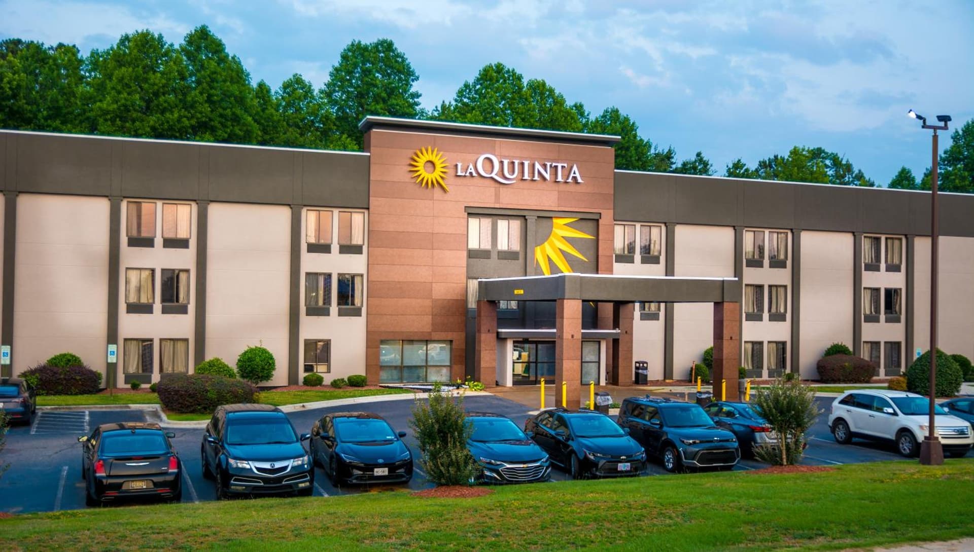 La Quinta Inn & Suites by Wyndham Fayetteville I-95 featured exterior or lobby in Fayetteville, NC — similar hotel