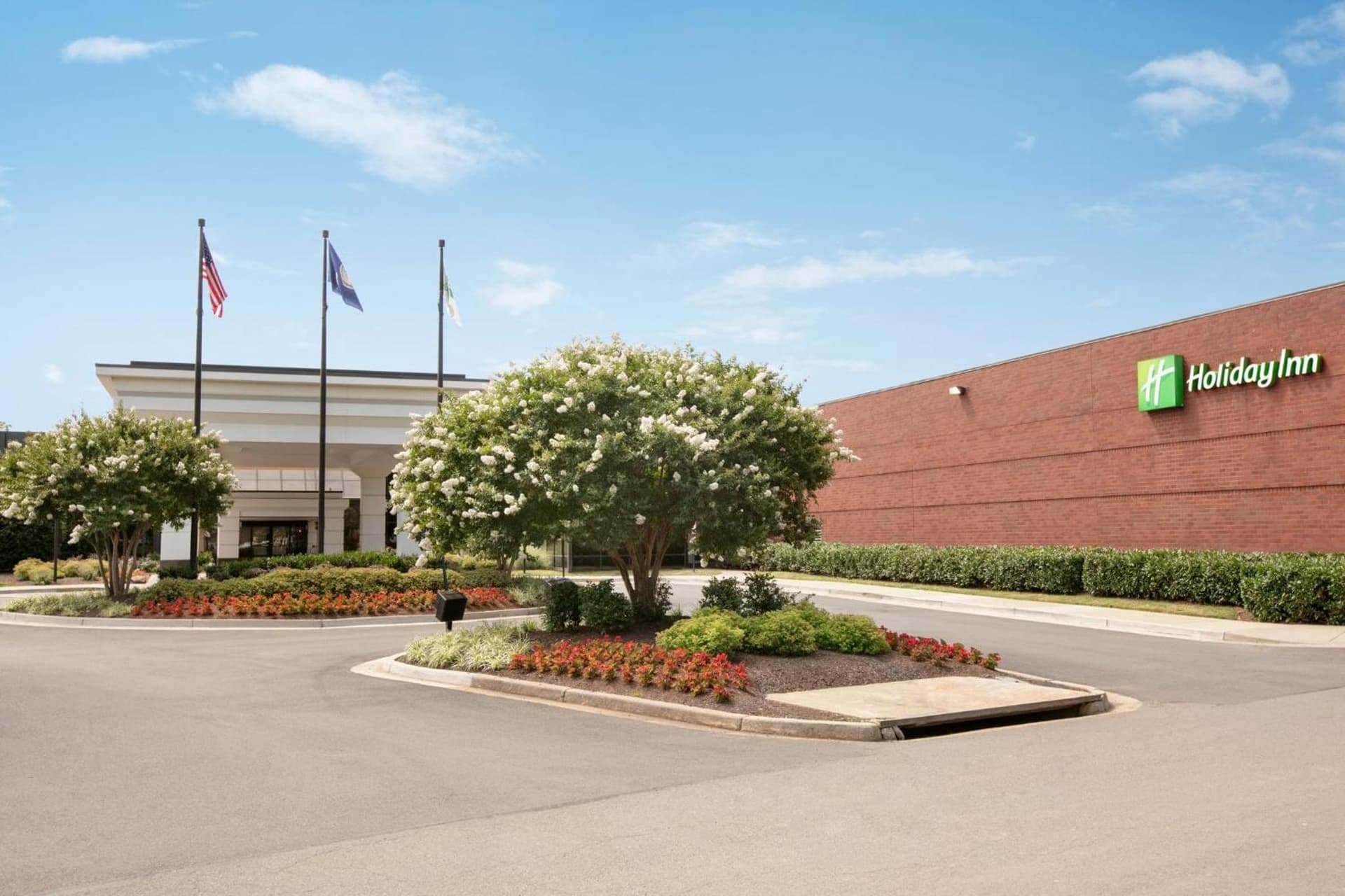 Holiday Inn Washington-Dulles International Airport by IHG featured exterior or lobby in Sterling, VA — similar hotel