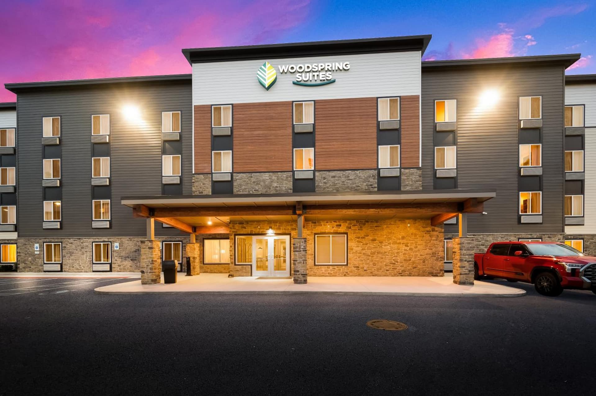 WoodSpring Suites East Lansing - University Area featured exterior or lobby in East Lansing, MI — similar hotel