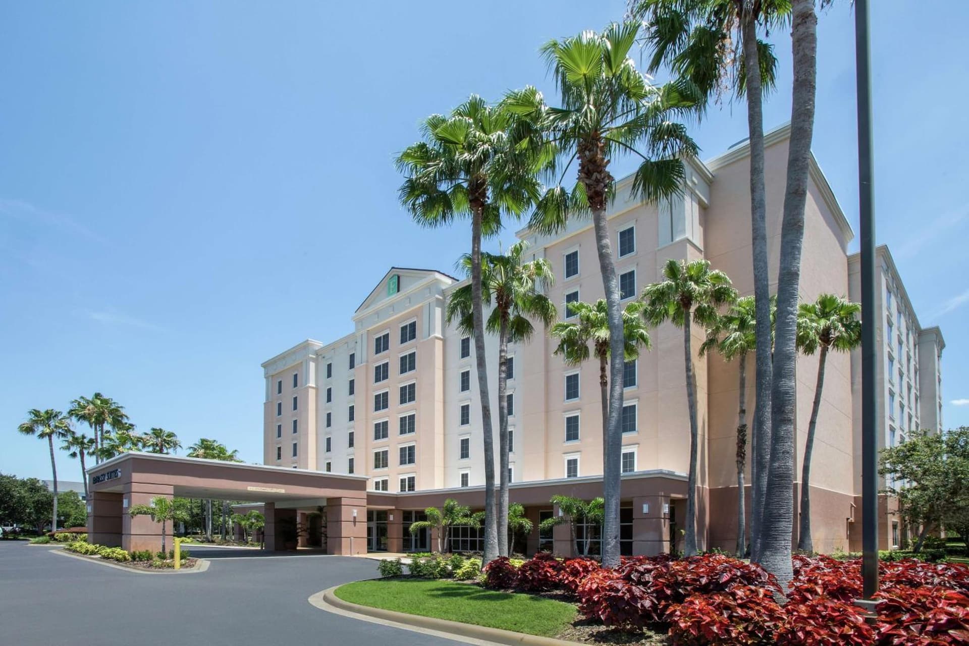 Embassy Suites by Hilton Orlando Airport featured exterior or lobby in Orlando, FL — similar hotel