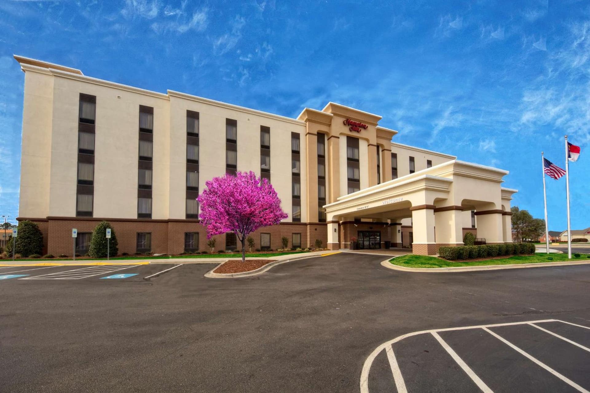 Hampton Inn Dunn featured exterior or lobby in Dunn, NC — similar hotel