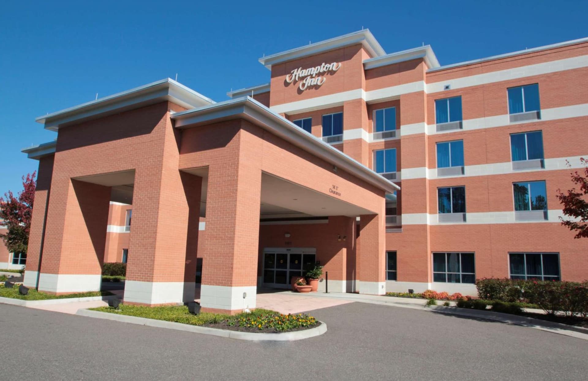 Hampton Inn Hampton-Newport News featured exterior or lobby in Hampton, VA — similar hotel