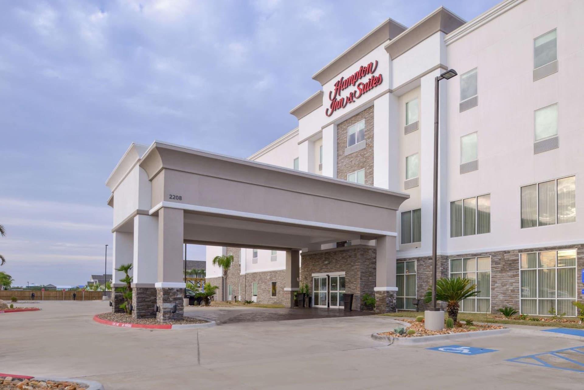 Hampton Inn and Suites Port Aransas featured exterior or lobby in Port Aransas, TX — similar hotel