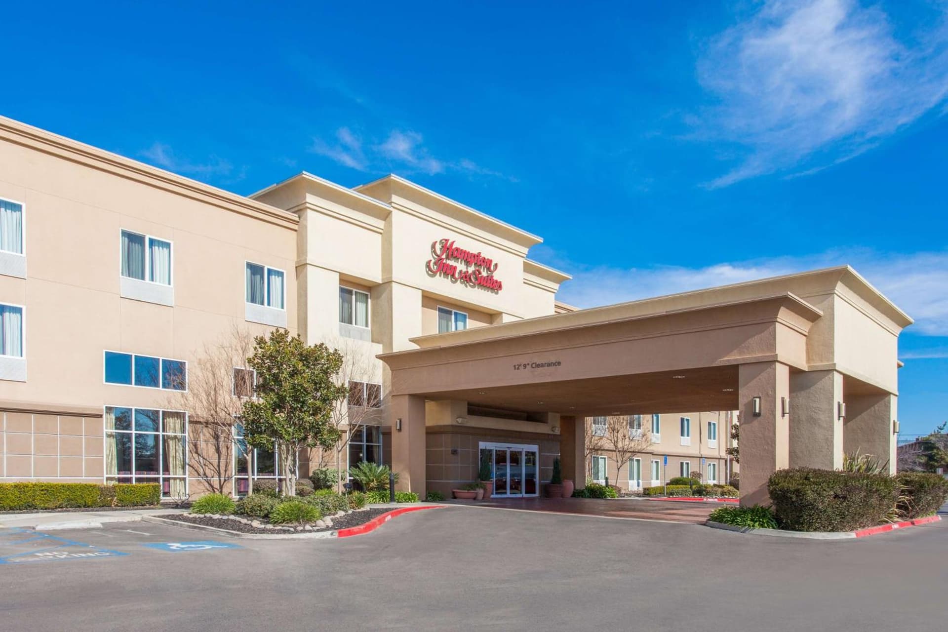 Hampton Inn and Suites Merced exterior or lobby in Merced, CA — main listing photo