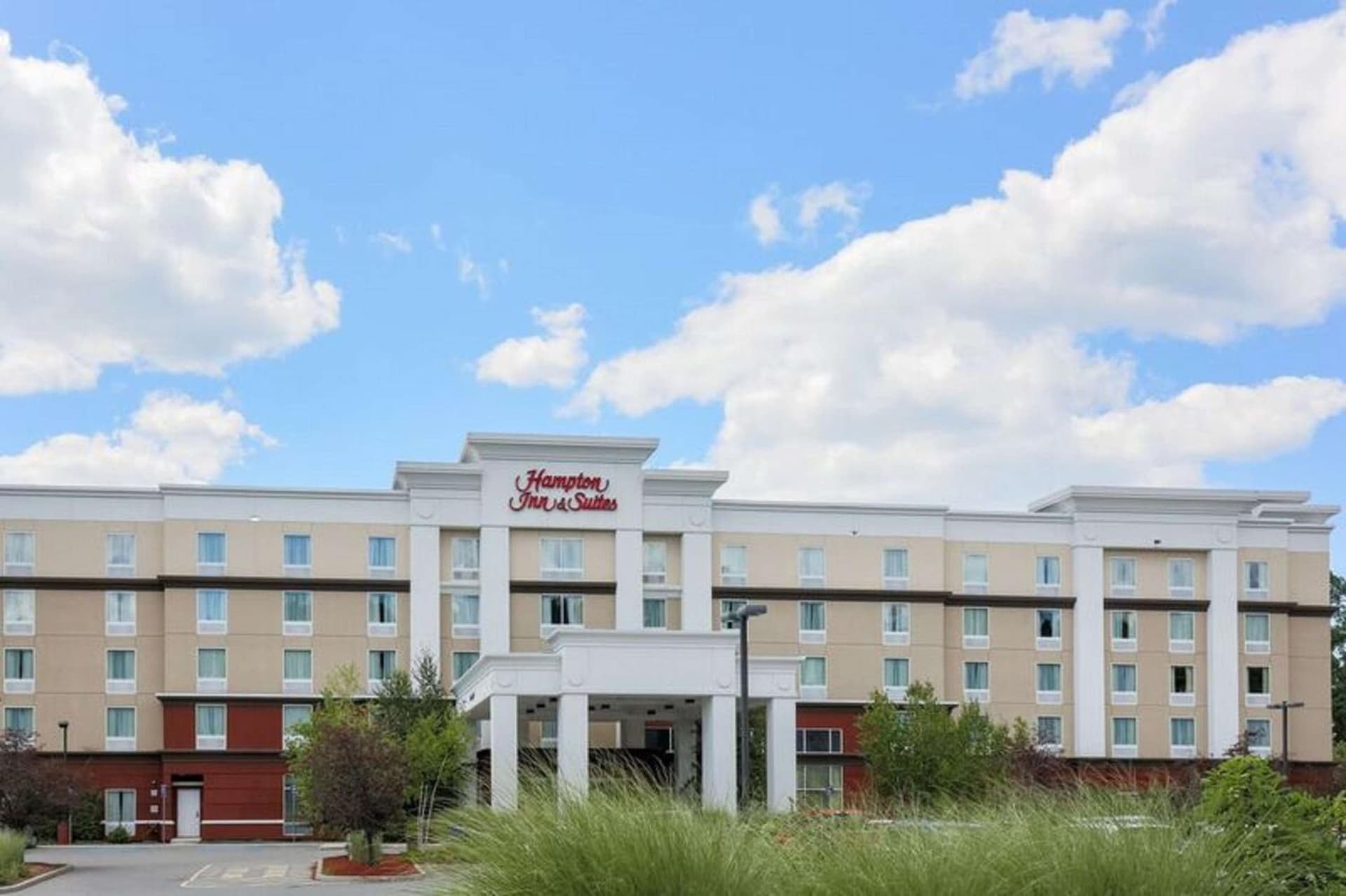Hampton Inn & Suites Poughkeepsie featured exterior or lobby in Spackenkill, NY — similar hotel