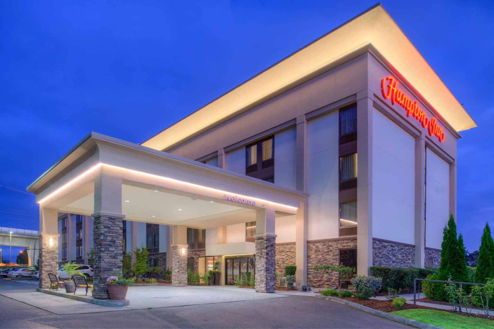 Hampton Inn Seattle Airport featured exterior or lobby in SeaTac, WA — similar hotel