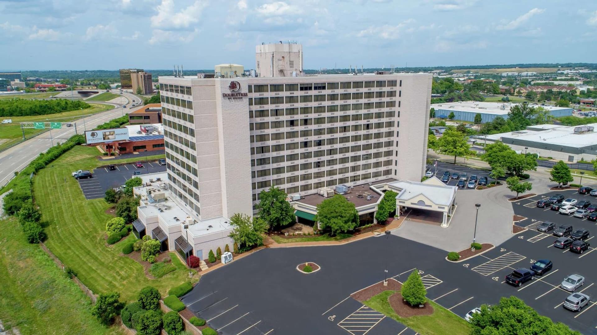 DoubleTree by Hilton St. Louis at Westport featured exterior or lobby in Maryland Heights, MO — similar hotel