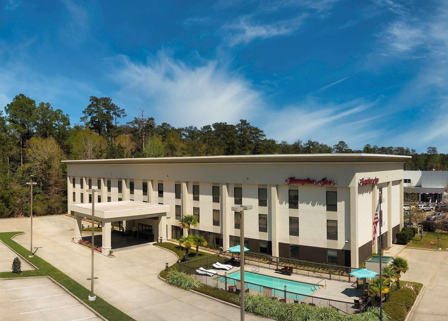 Hampton Inn Covington/Mandeville featured exterior or lobby in Covington, LA — similar hotel