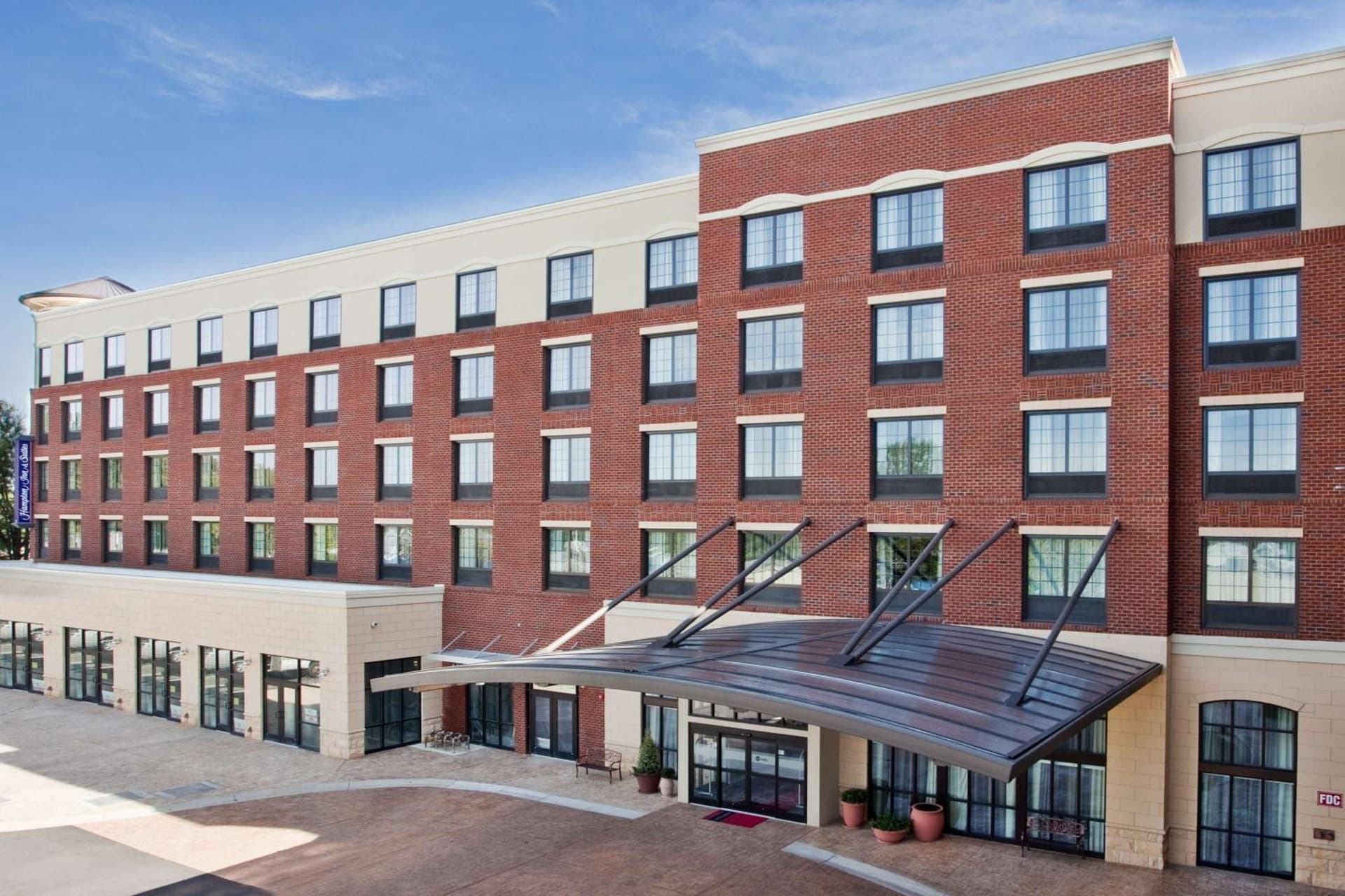 Hampton Inn & Suites Chapel Hill/Carrboro featured exterior or lobby in Chapel Hill, NC — similar hotel