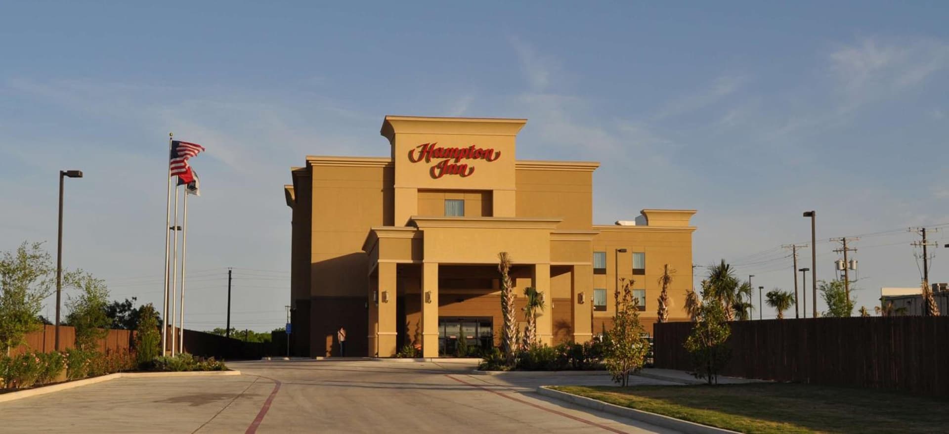 Hampton Inn Pleasanton featured exterior or lobby in Pleasanton, TX — similar hotel
